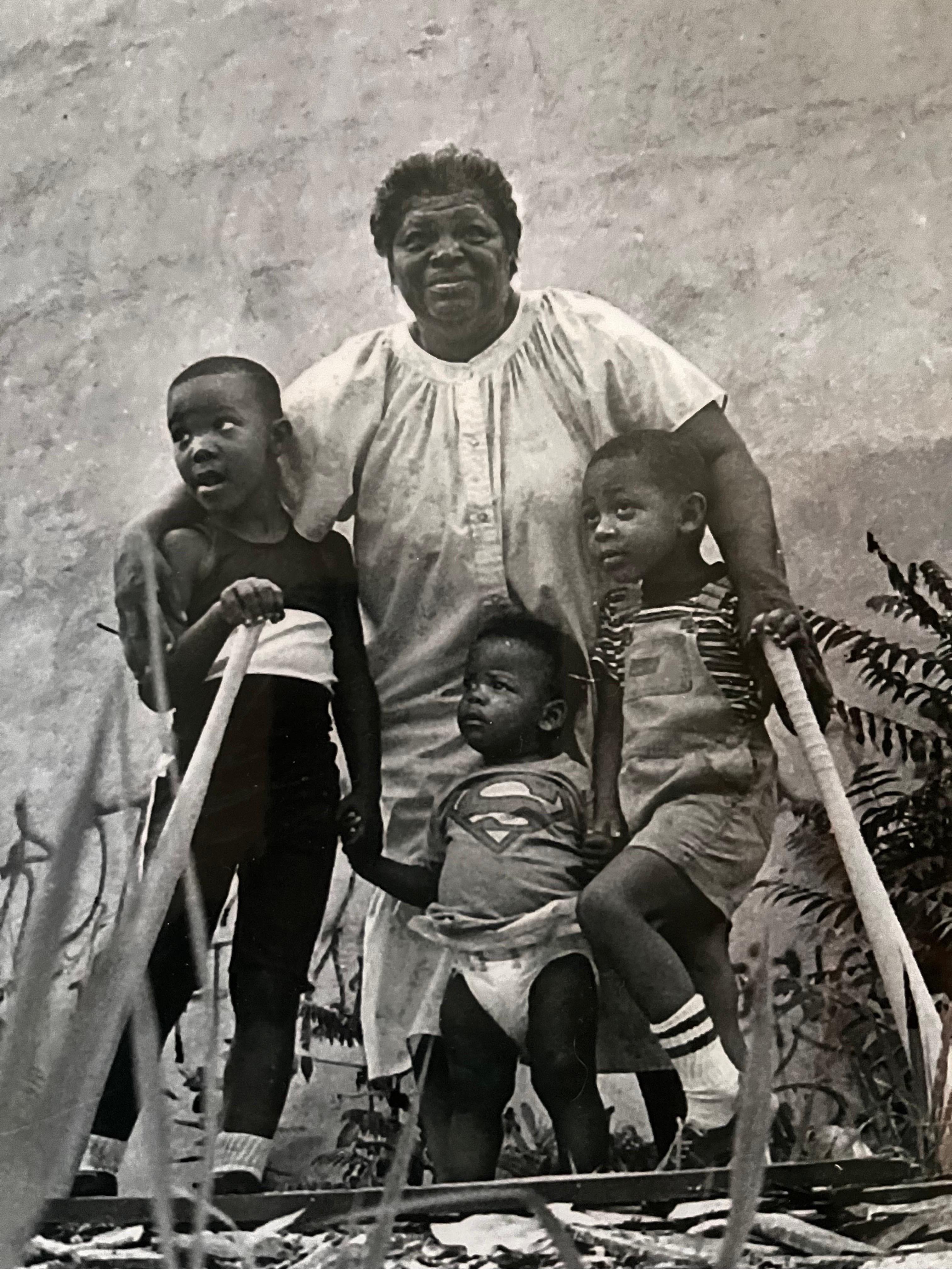 Black and White photo of African American Mother and Children

Glossy Paper mounted on Foam Core
Overall size = 18