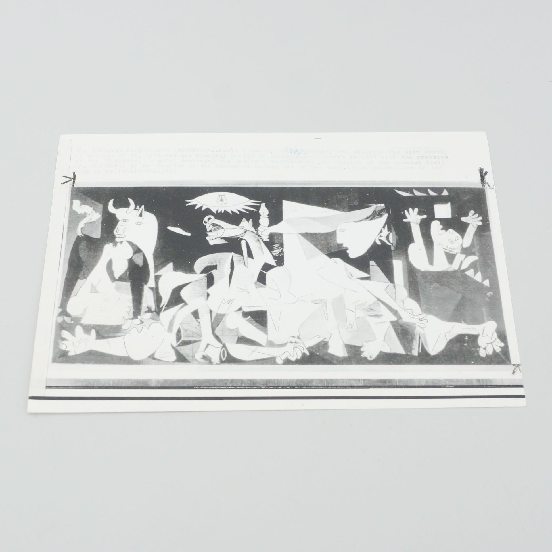 Black and white archive photography of Picasso Painting 'Guernica', 1973.

In original condition, with minor wear consistent with age and use, preserving a beautiful patina.

Materials:
Paper

Dimensions:
D 0.2 cm x W 23.9 cm x H 16.9 cm.