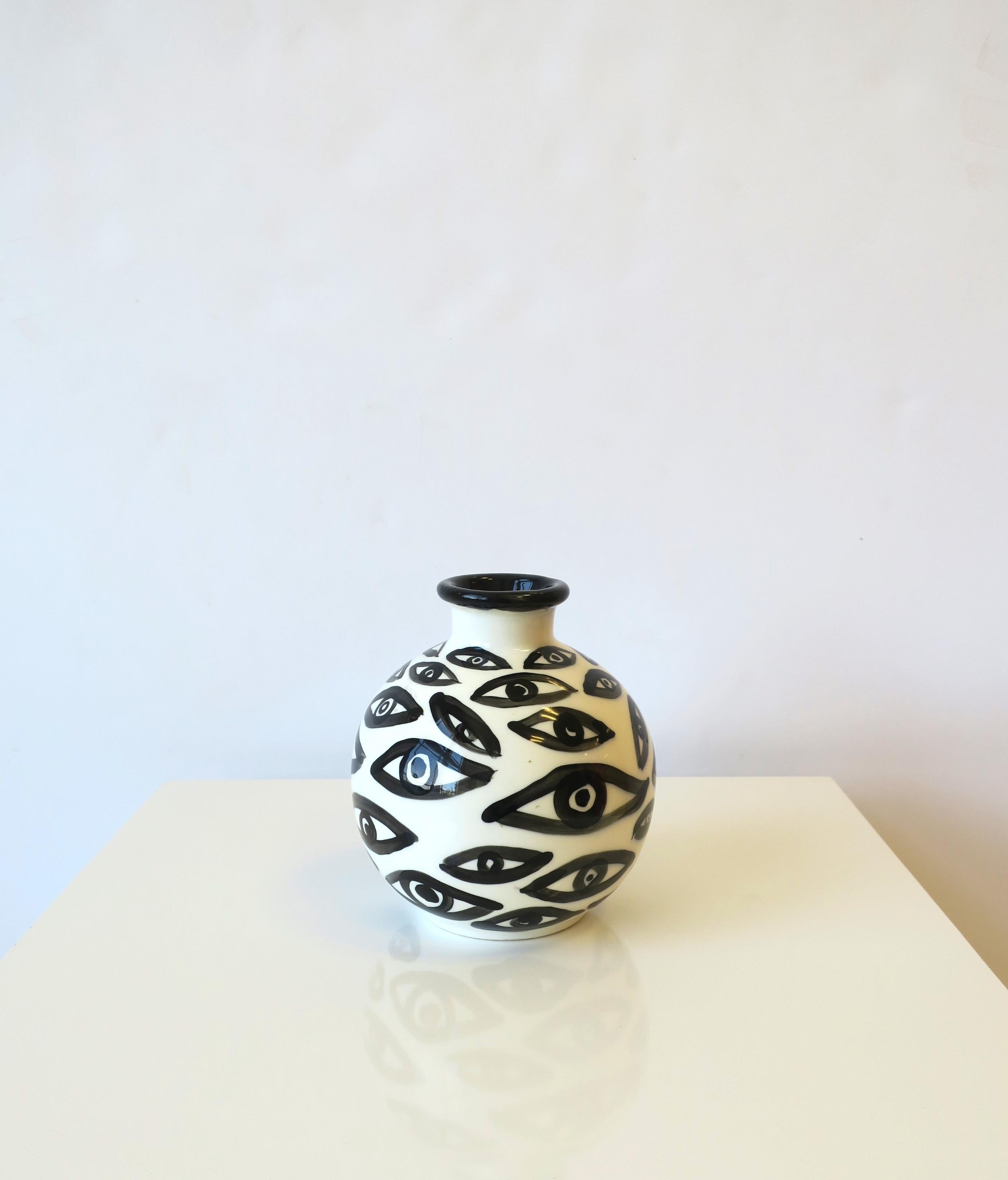 Glazed Black and White Pottery Vase with Eye Design For Sale