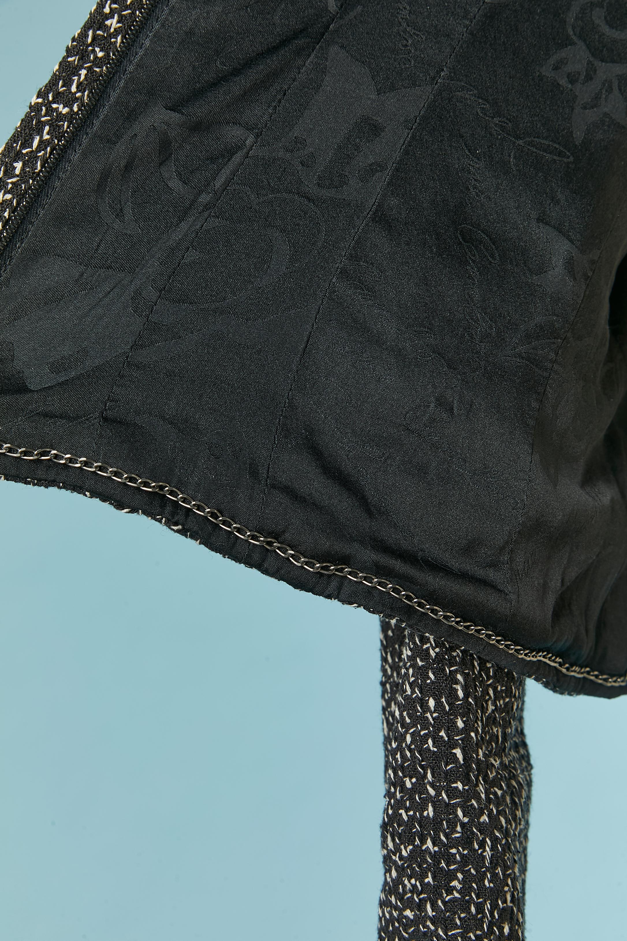Black and white silk tweed jacket with zip closure on the middle front CHANEL 3
