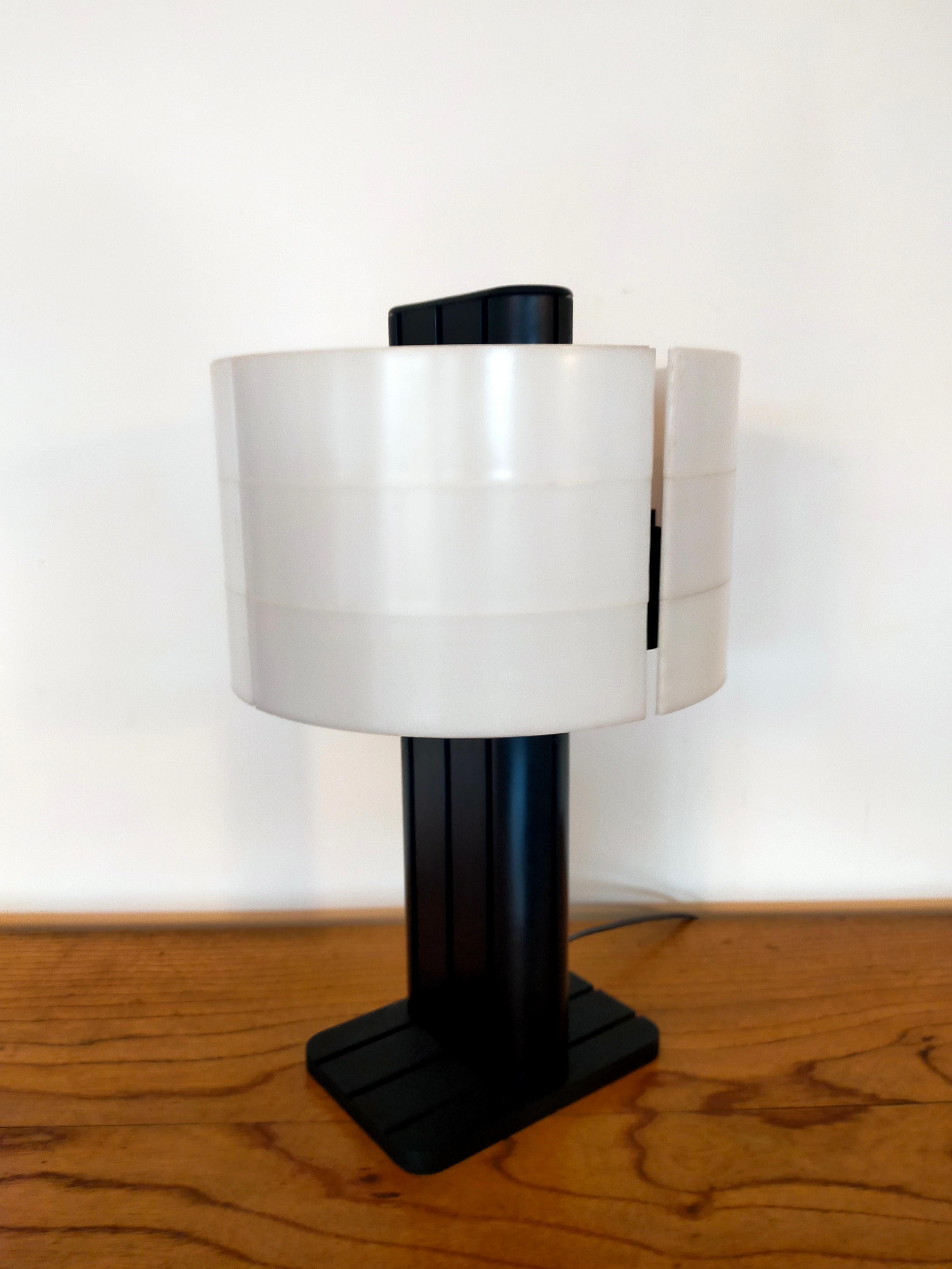 Black an white strigam desk lamp by Jean-Pierre Vitrac (circa 1980) by Verre Lumiere Editor
Black lacquered cast aluminum base, acrylic shade
Measures: 15.94 H x 9.45 inches
40.5 H x 24 cm.