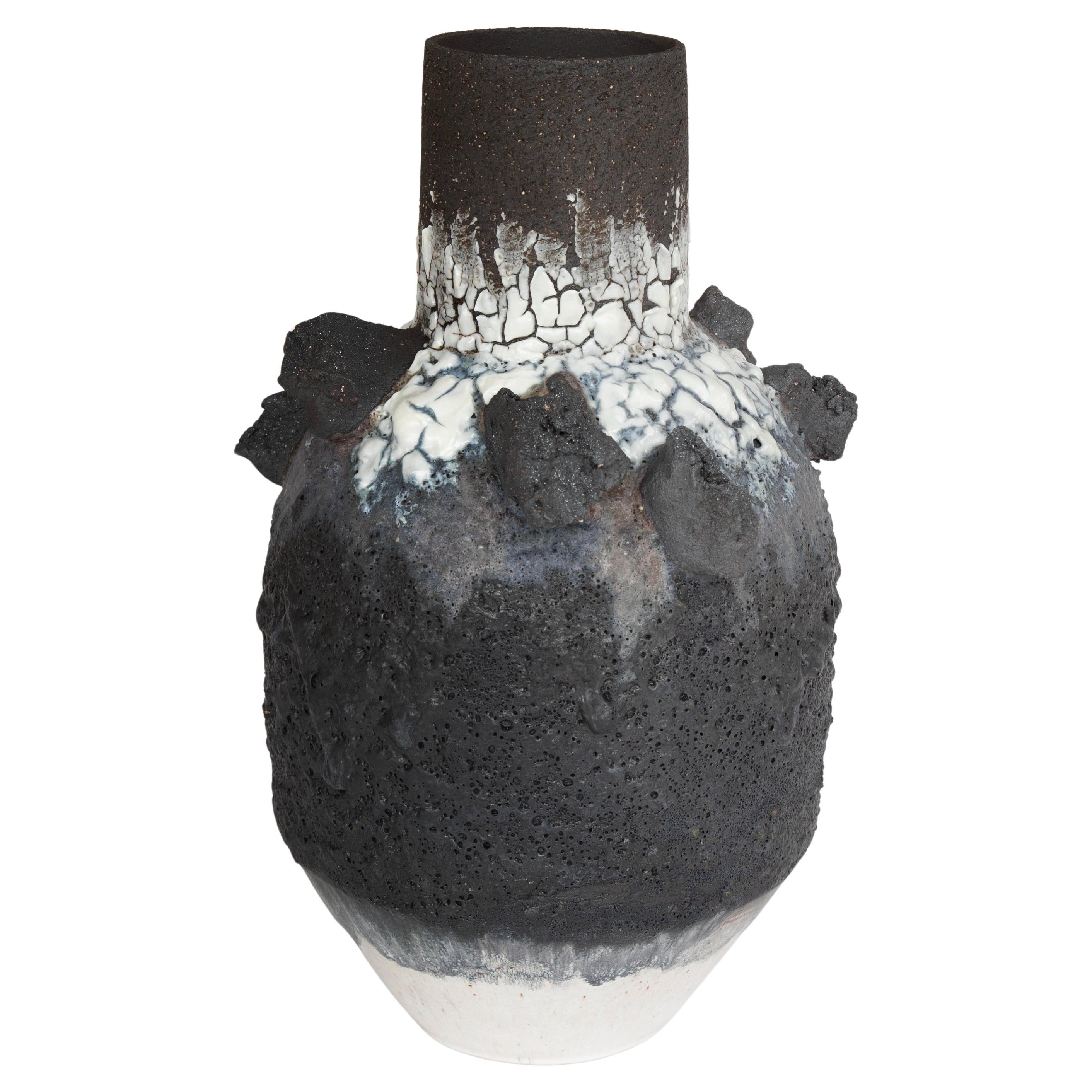 Black and white textured volcanic vase with black clay 'rocks' and iron filings