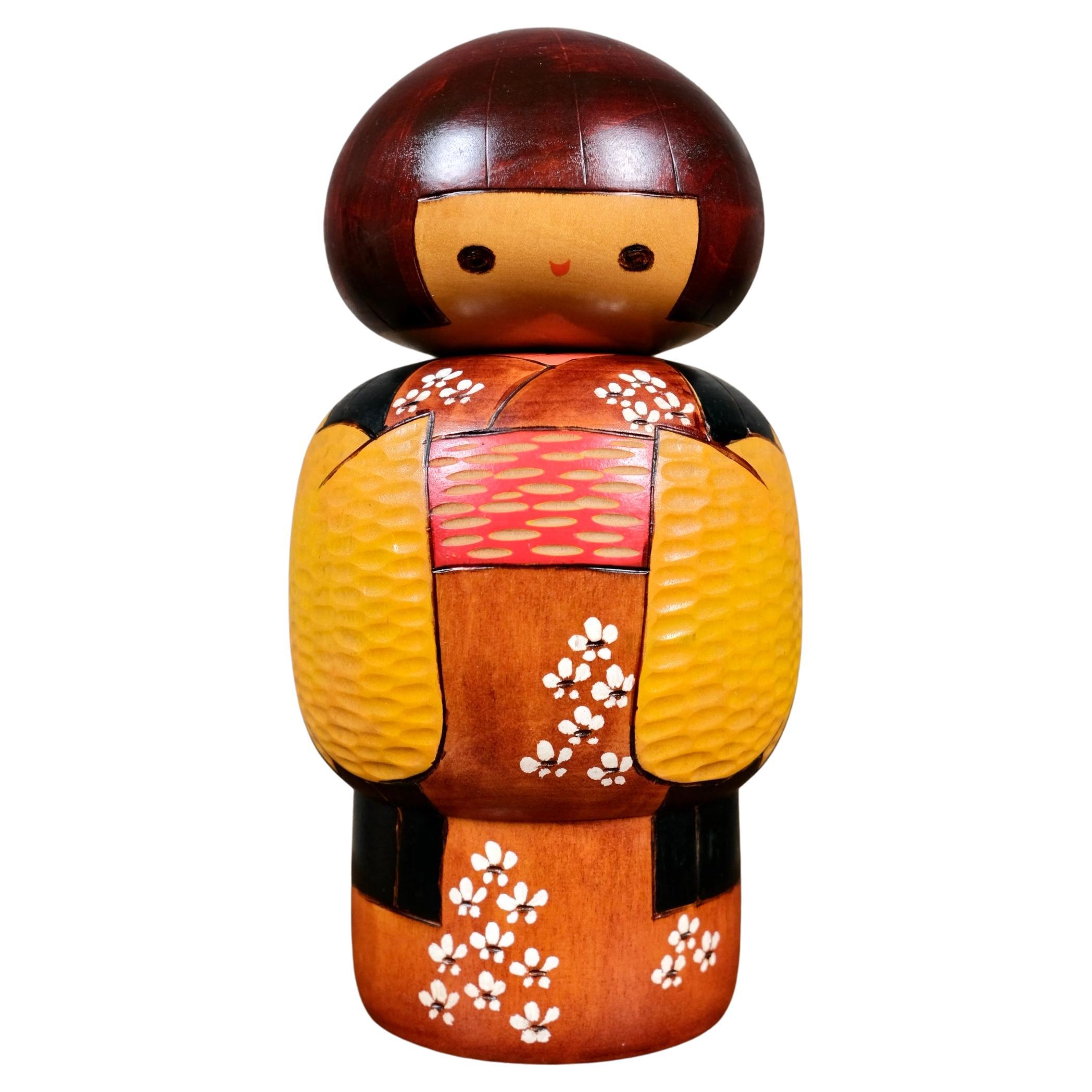 Kimono kokeshi negro y amarillo de Bitoku, años 70, Japón
