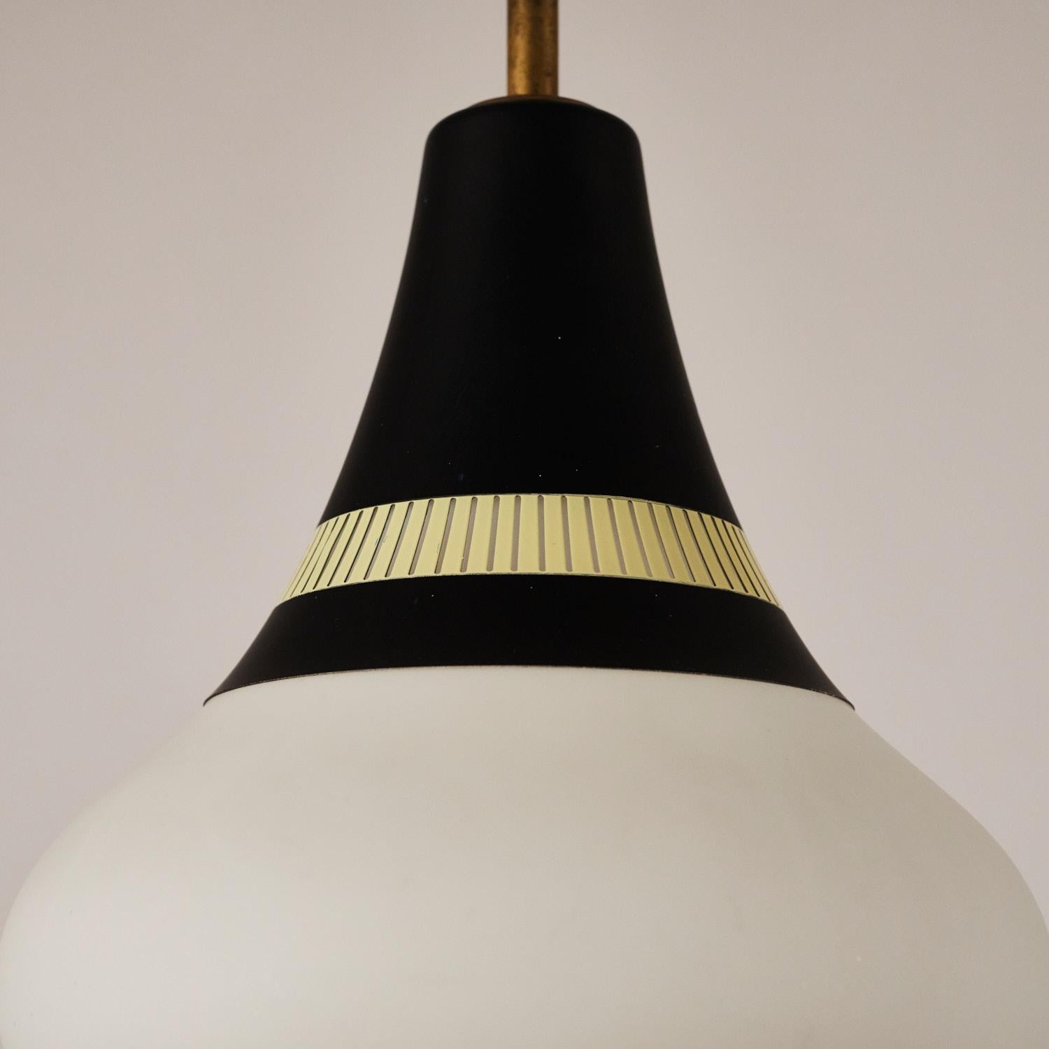 Original and rare white opaline glass pendants by Stilnovo, marked with manufacture label.