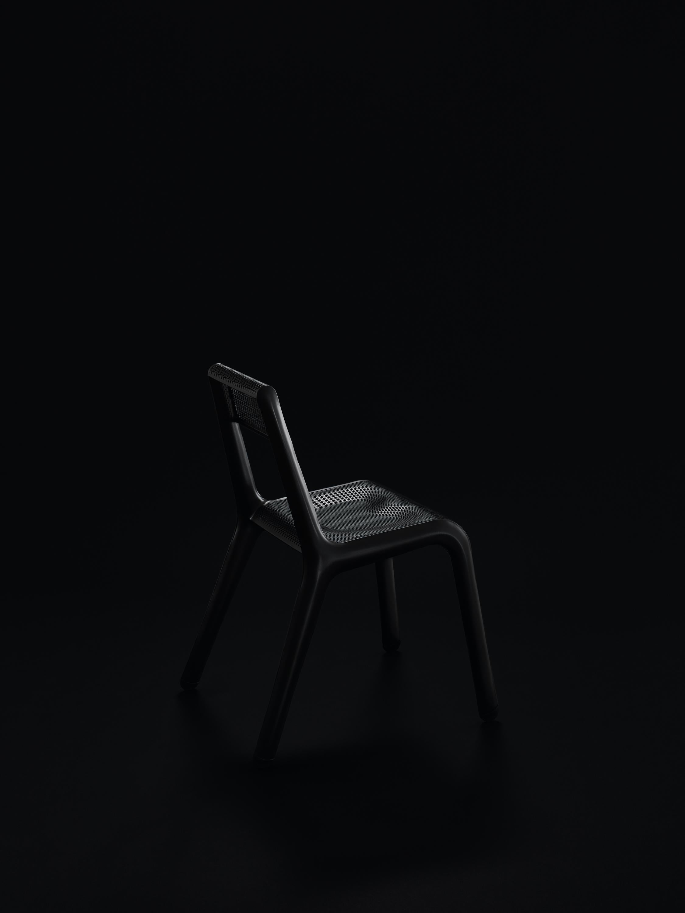 Black Anodic Ultraleggera chair by Zieta
Dimensions: D 58 x W 49 x H 78 cm 
Material: Aluminum. 
Finish: Powder-coated.
Available in other colors. Also available in Leggera version.


ULTRALEGGERA is a minimalist light metal chair. Thanks to its
