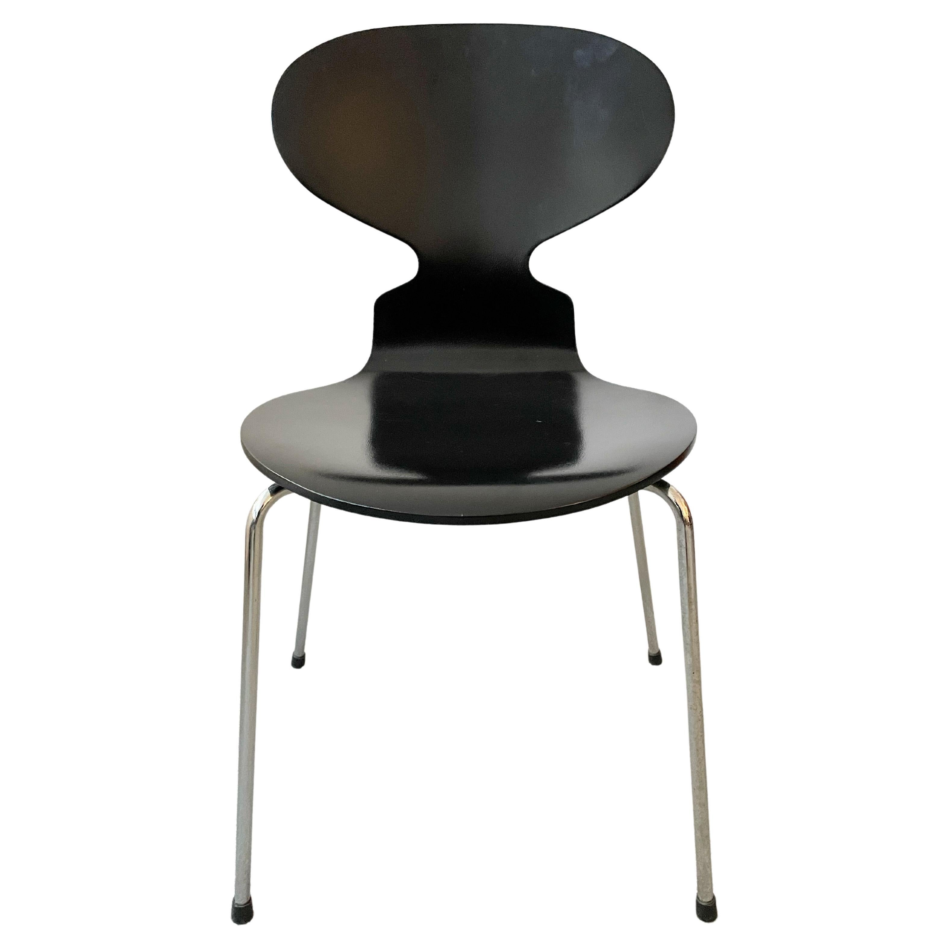 Black Ant chair by Arne Jacobsen for Fritz Hansen. The official name of the chair is model 3101', but they are also called 'the Ant'. Made of black lacquered plywood.