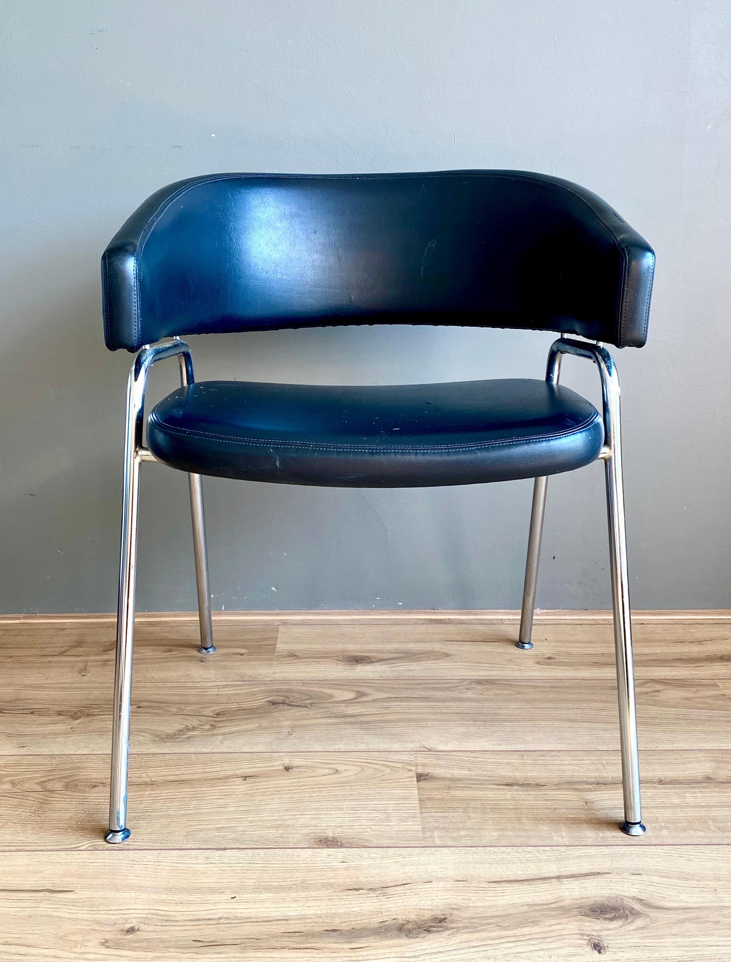 Rare armchair, Model AP22, designed by Hein Salomonson and Theo Tempelman in 1960. The chair was manufactured by AP Originals, originally for the RAI restaurant Amsterdam. The chair features a Chromed metal base and the original Black Leatherette
