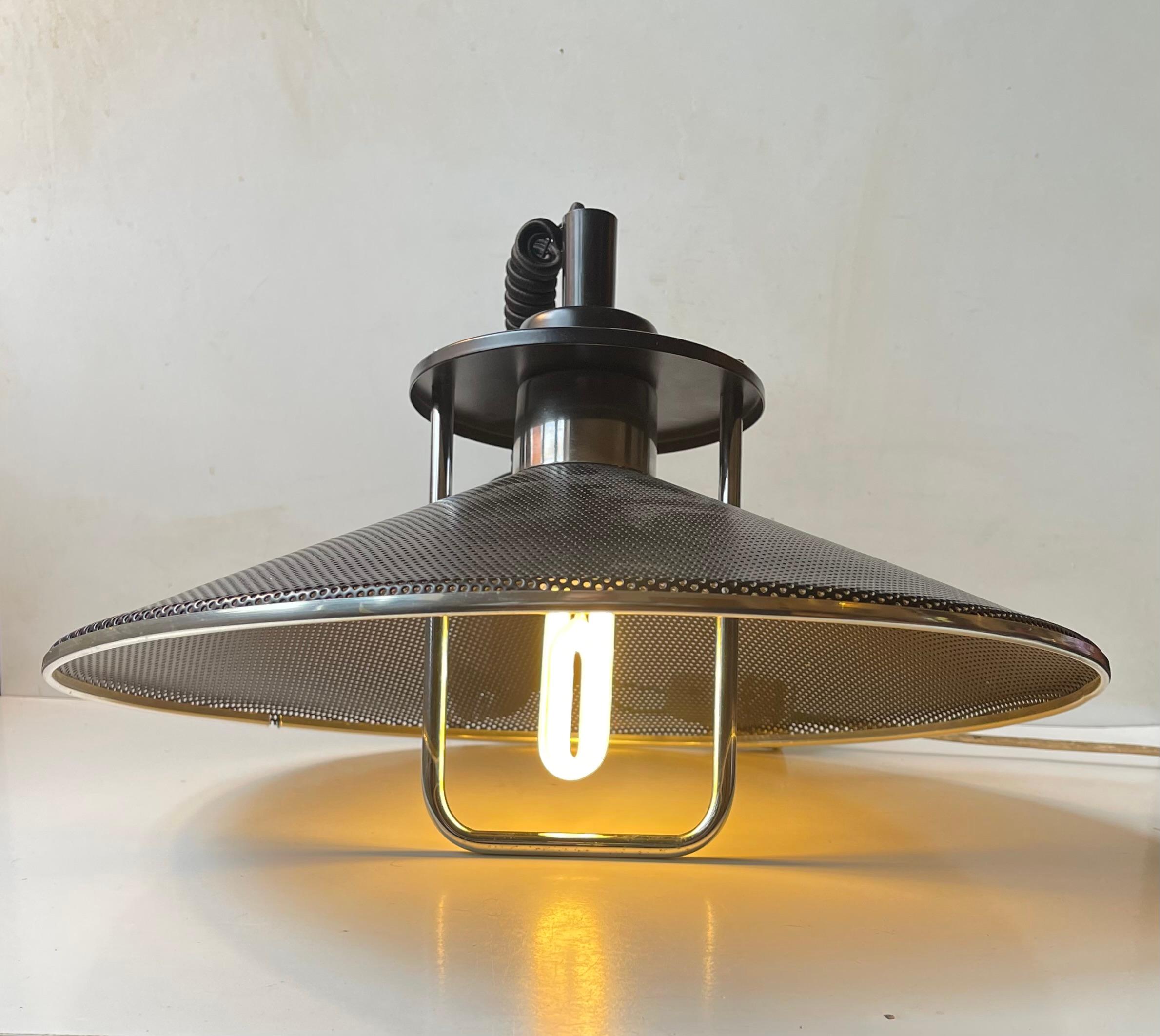 A stylish height adjustable vintage Danish hanging Lamp. In Denmark used over an architects, artist or studio work-space due to its versatility. The light is in a very nice vintage condition with light ware. It features an Italian suspension system,