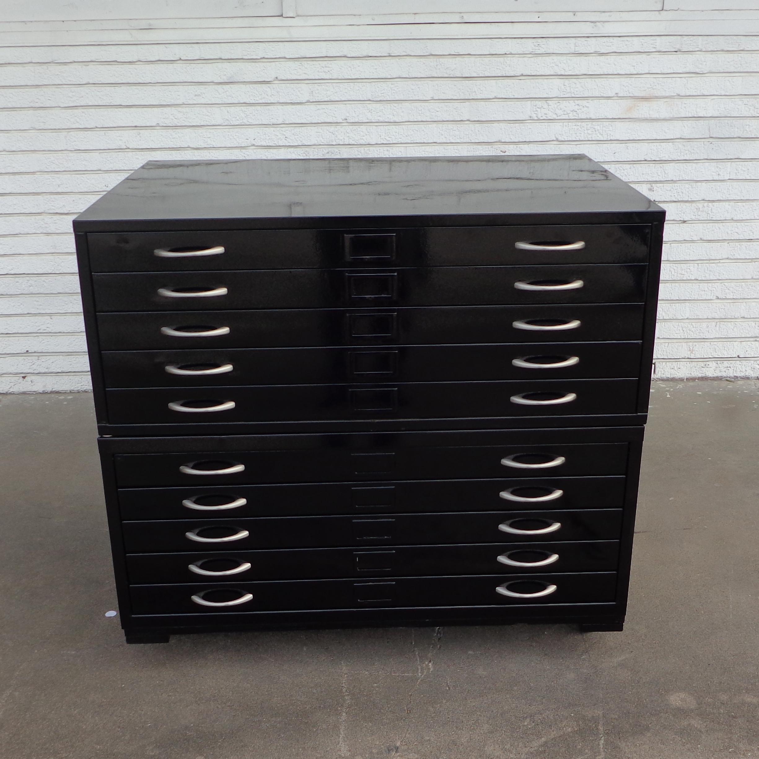 Vintage black architectural drafting flat file cabinets

Restored in a gloss black. 10 drawers with chrome pulls. 

Interal Dimensions:
Height 2 in. 
Width 37 1/4 in. 
Depth 26 in. 