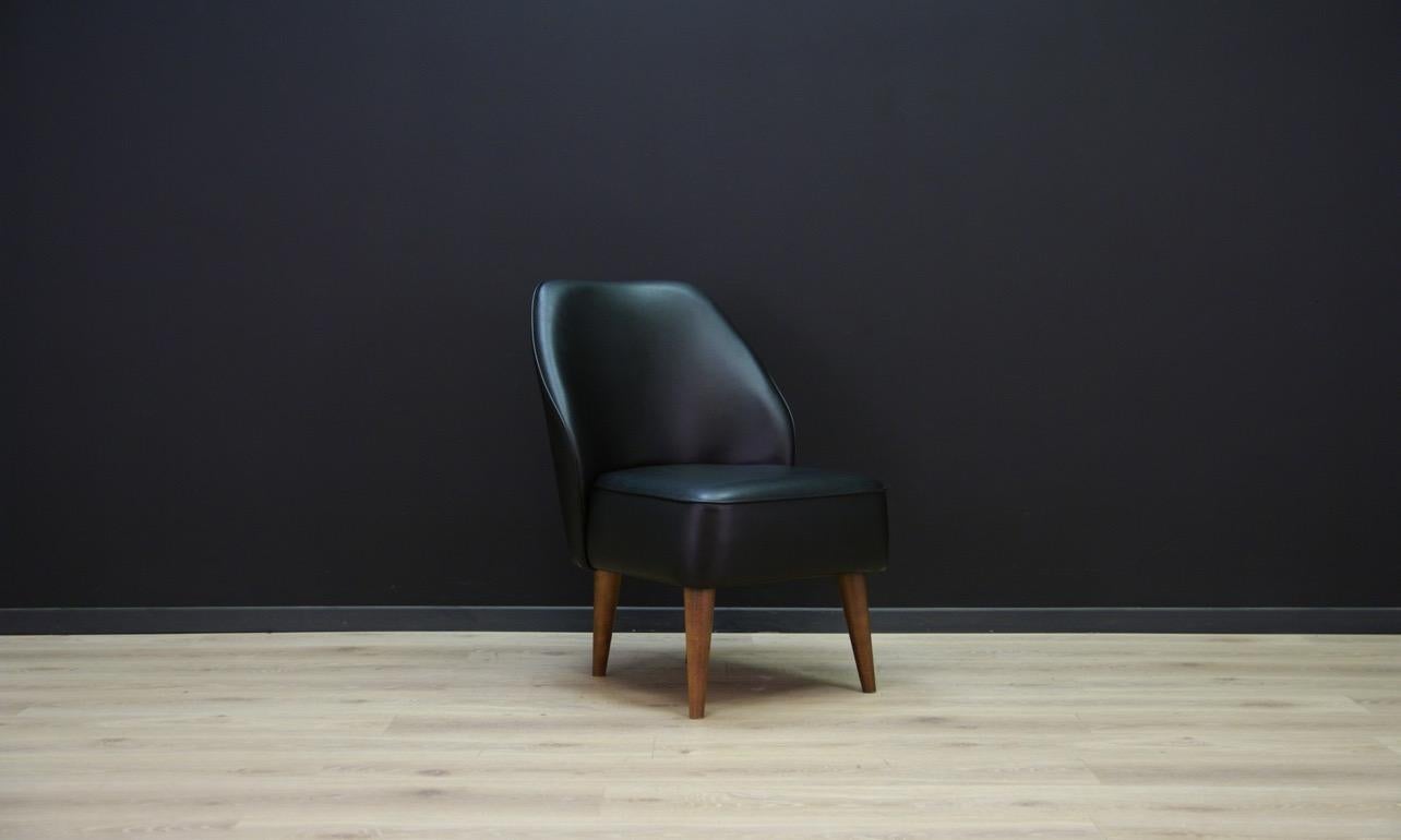 Unique armchair from the 1980s-1990s, beautiful form. Armchair covered with original eco-leather. Legs made of solid wood. Preserved in good condition (scratches and abrasions on the skin) - directly for use.

Dimensions: Height 84 cm, seat height