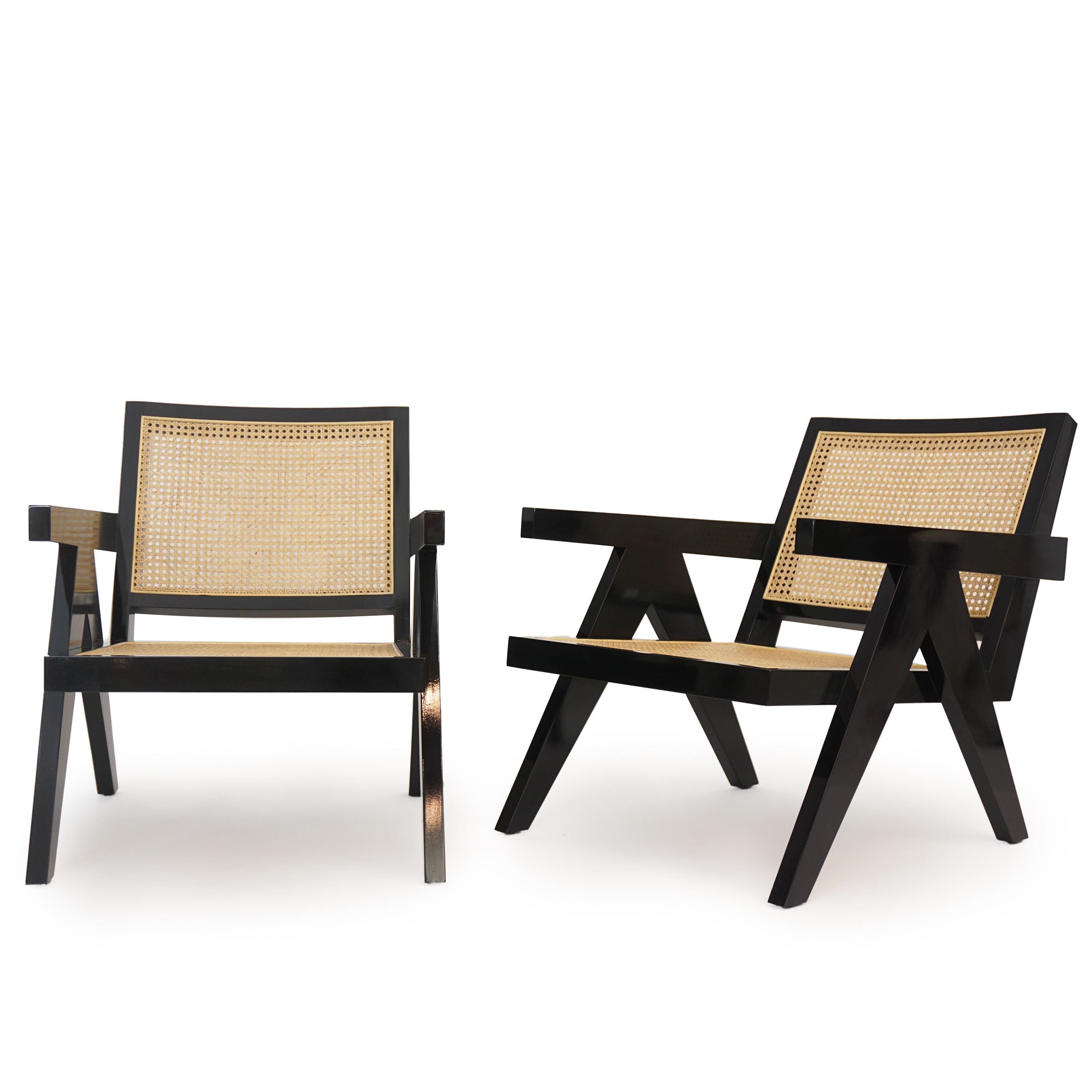 Made to order black armchair made with natural cane rattan and mahogany wood painted black. 

Measurements: Outside - 28
