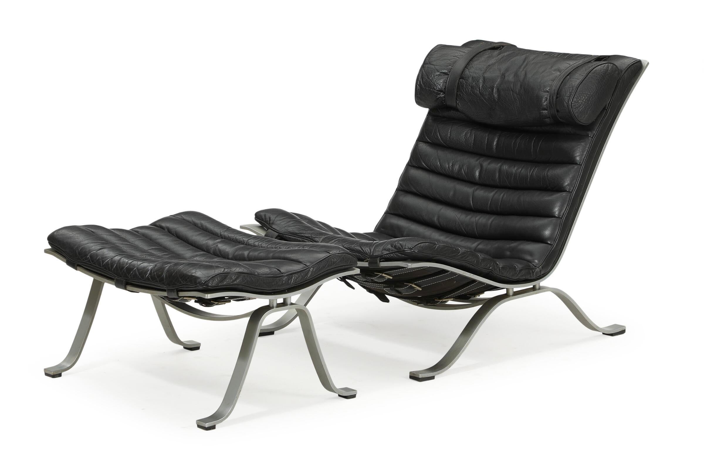 Black Arne Norell Ari chair and ottoman , Sweden 2000

Black leather steel frame in a well kept condition.

We can arrange delivery in NYC area