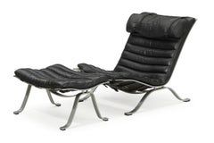Black Arne Norell Ari chair and ottoman , Sweden