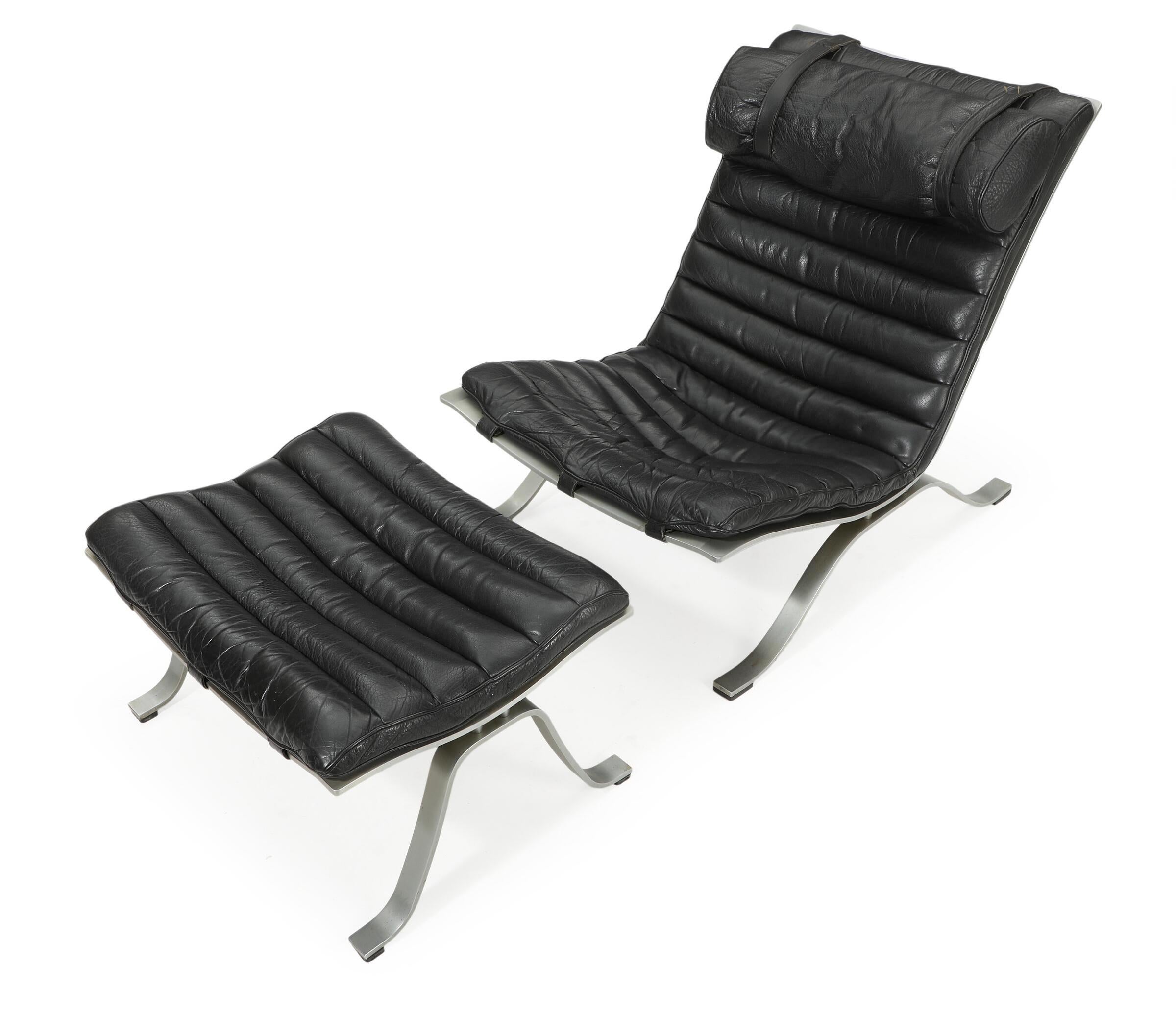 Modern Black Arne Norell Ari chair and ottoman , Sweden For Sale