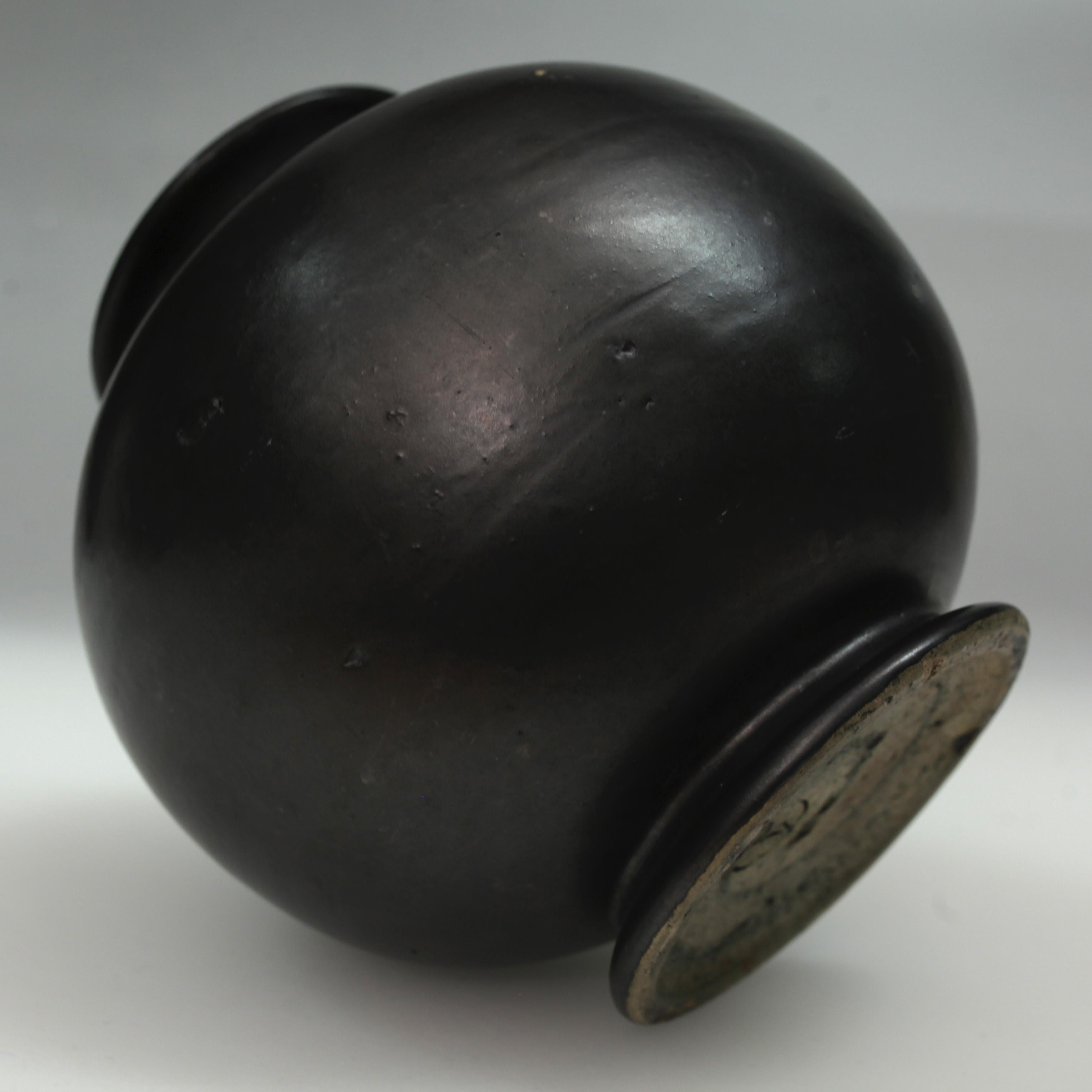 Art Deco vase with a matte black glaze produced by Dutch manufacturer ADCO, circa 1935.