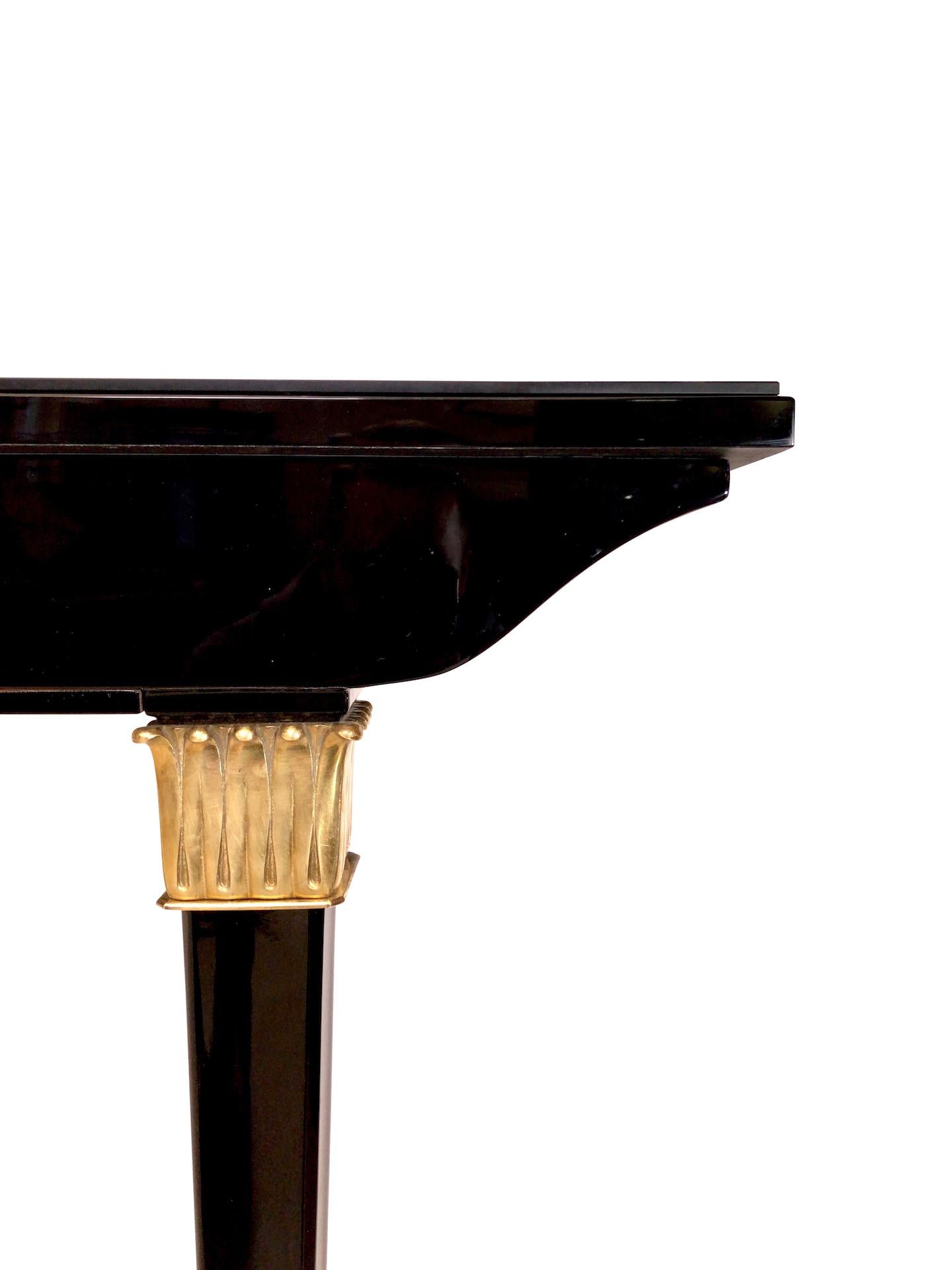 French Black Art Deco Console Table Two Thin Feed Metal Sabots and Golden Applications For Sale