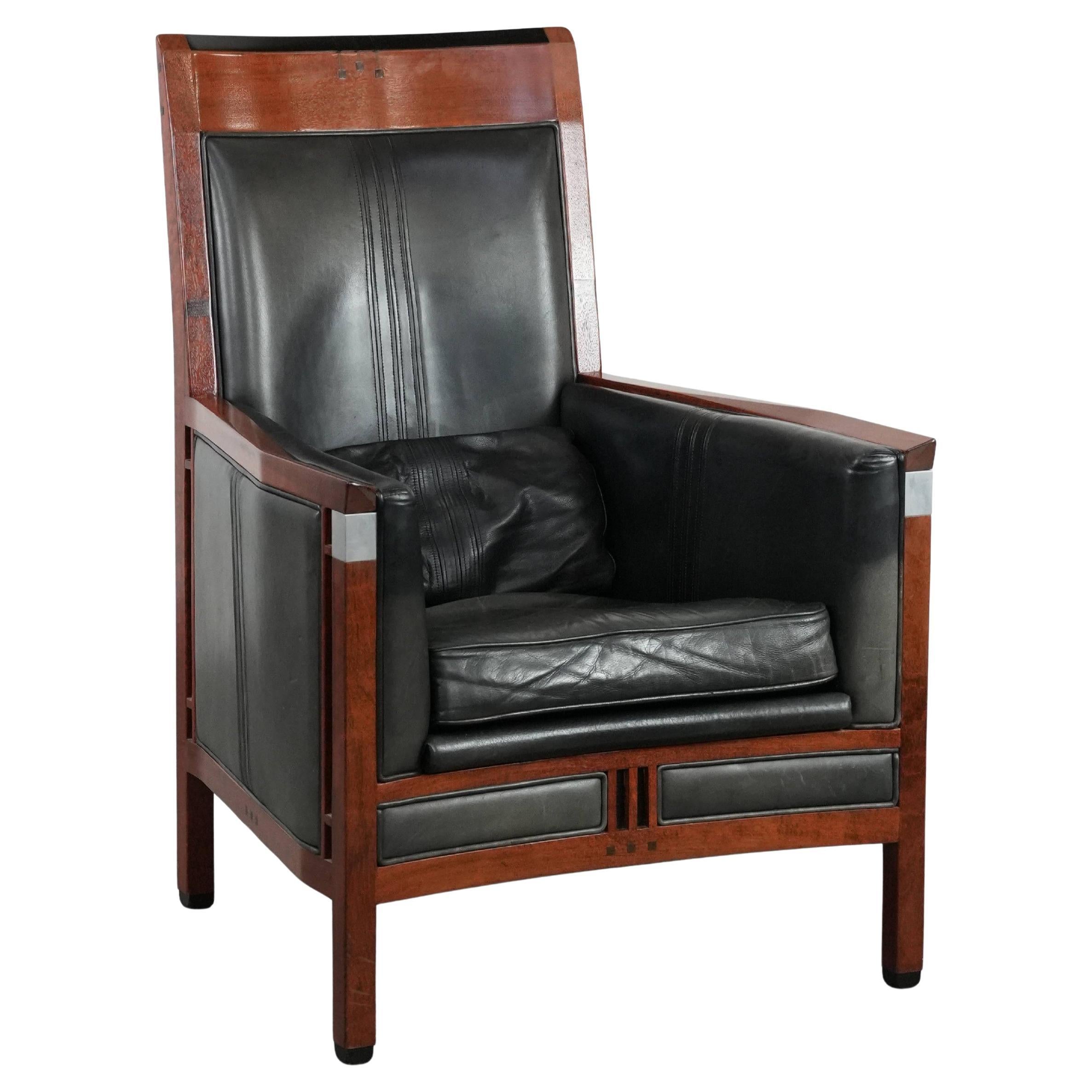 Black Art Deco cowhide leather and wooden design armchair with a high back