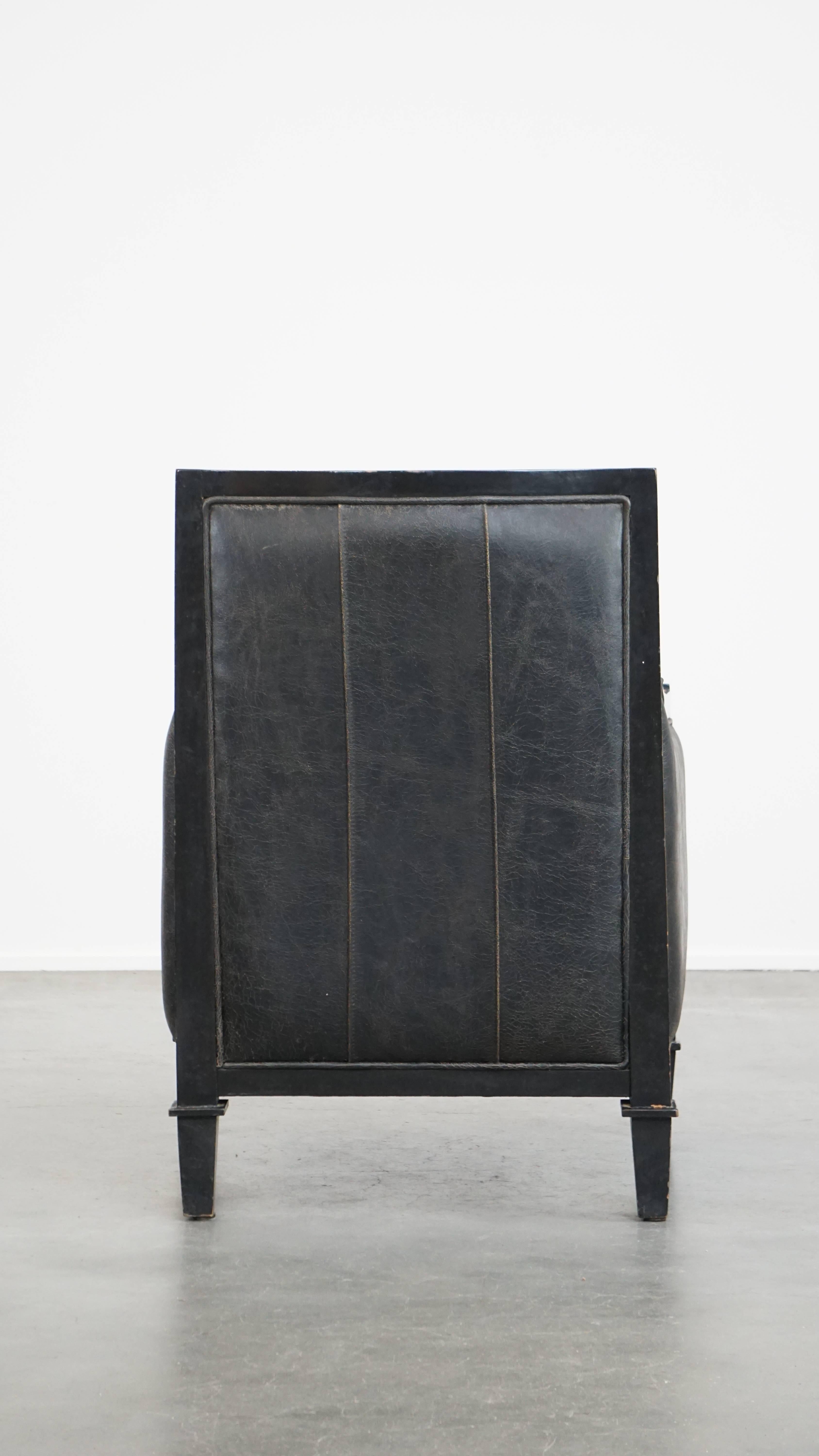 Black Art Deco design cowhide leather and wooden armchair with a loose cushion In Good Condition For Sale In Harderwijk, NL