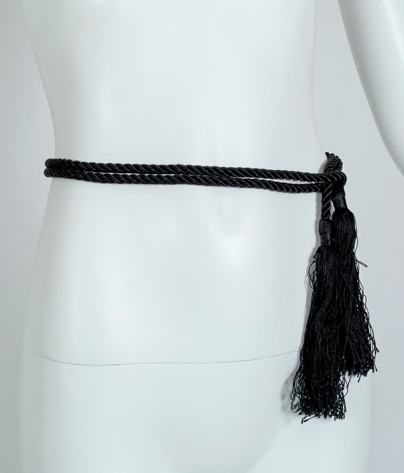 An ode to the Victorian jet ropes worn in the 1800s, this beautiful and multi-functional late Edwardian accessory supplies the same glamour without the hefty price tag. Its over 5-foot length allows it to be worn as a long rope belt, as a waist