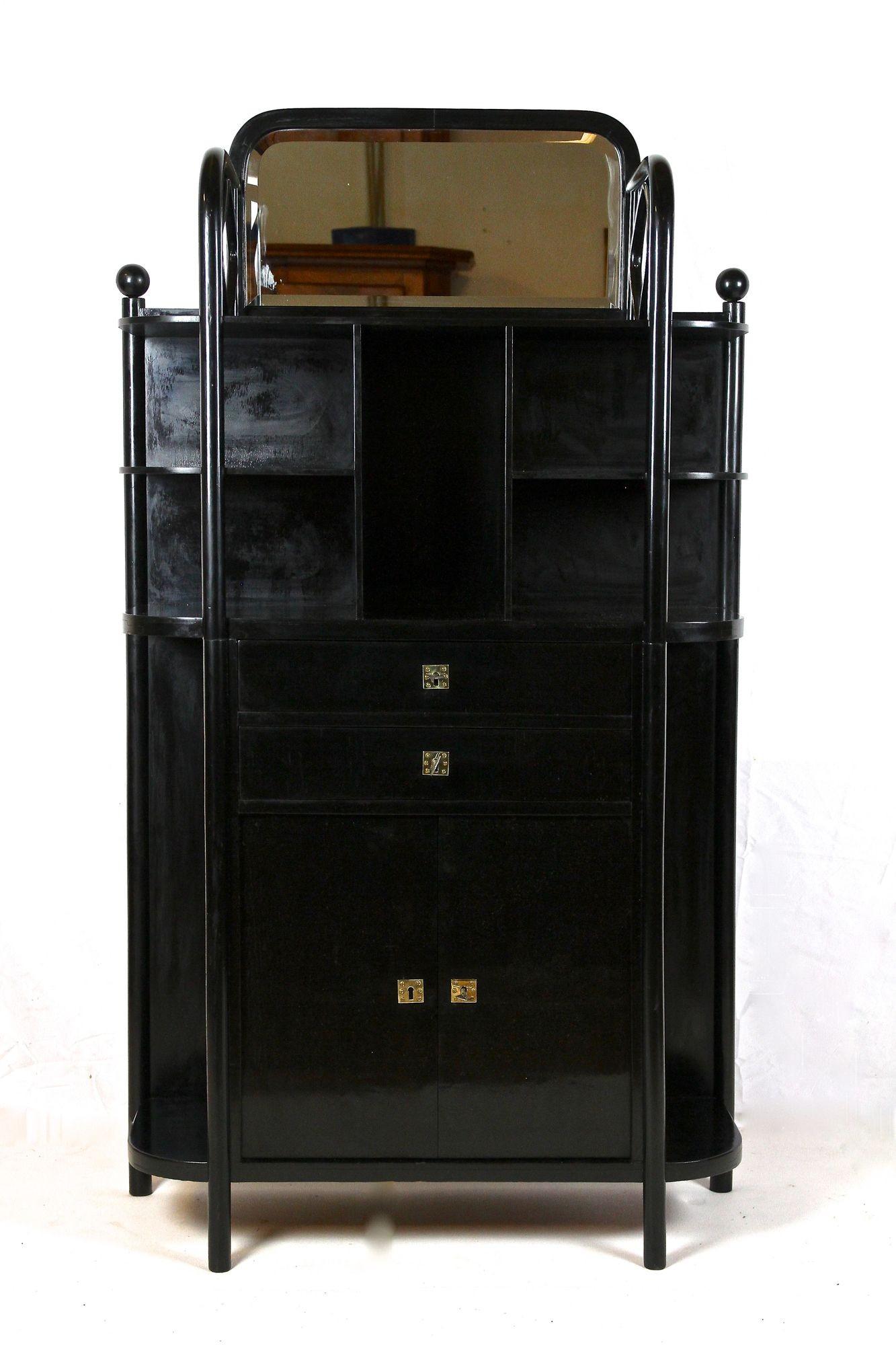 Another rarity in our highly demanded Art Nouveau furniture collection: an absolute fantastic, unusual black display cabinet from the early period around 1905, designed by none other than the world famous Austrian architect Josef Hoffmann (1870 -