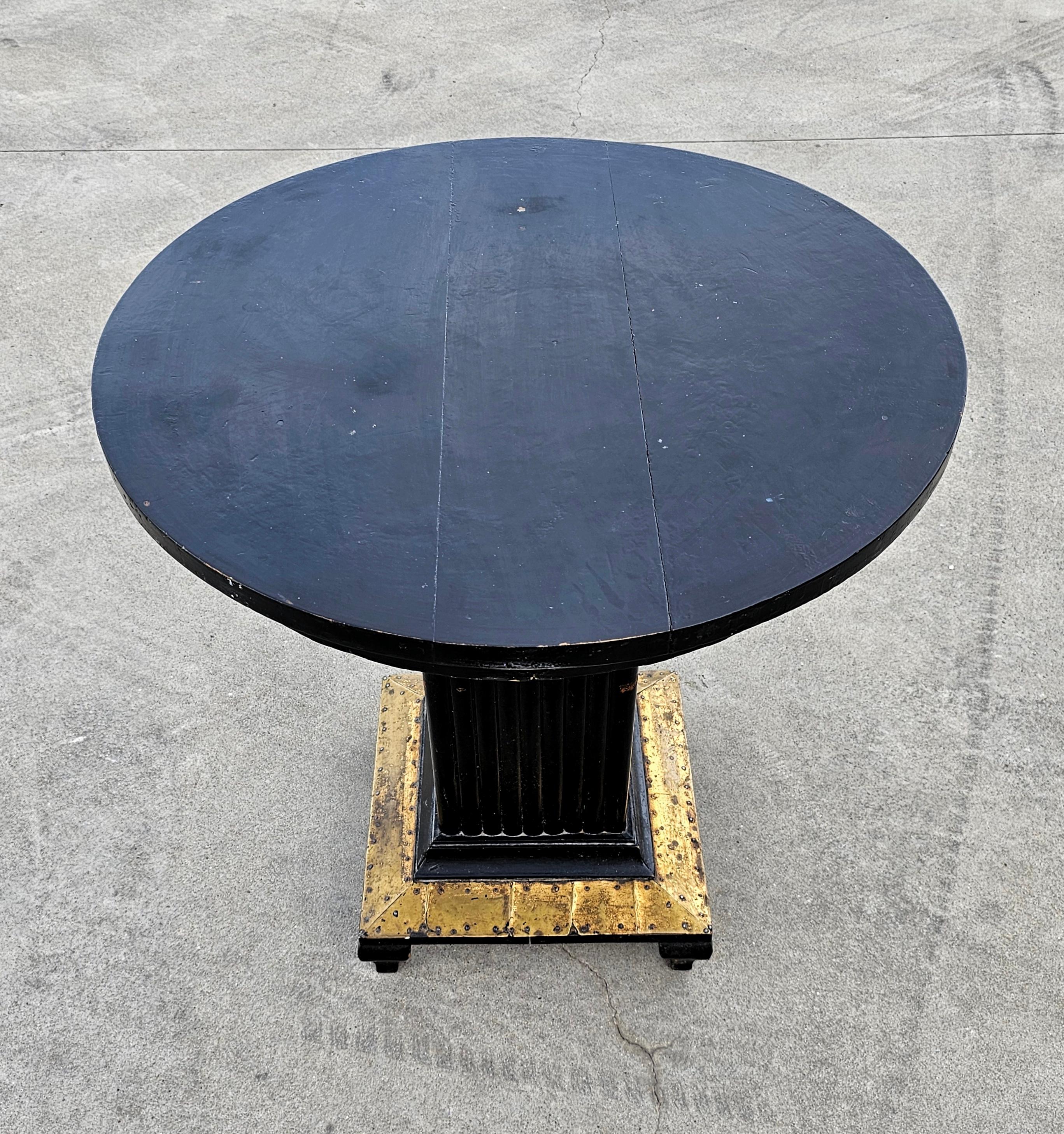 In this listing you will find an Black Antique Art Nouveau Gueridon table, with decorative elements done in brass. It is made in style of renowned cabinet maker Koloman Moser. Table is the standard height for a dining table, so it could be used for