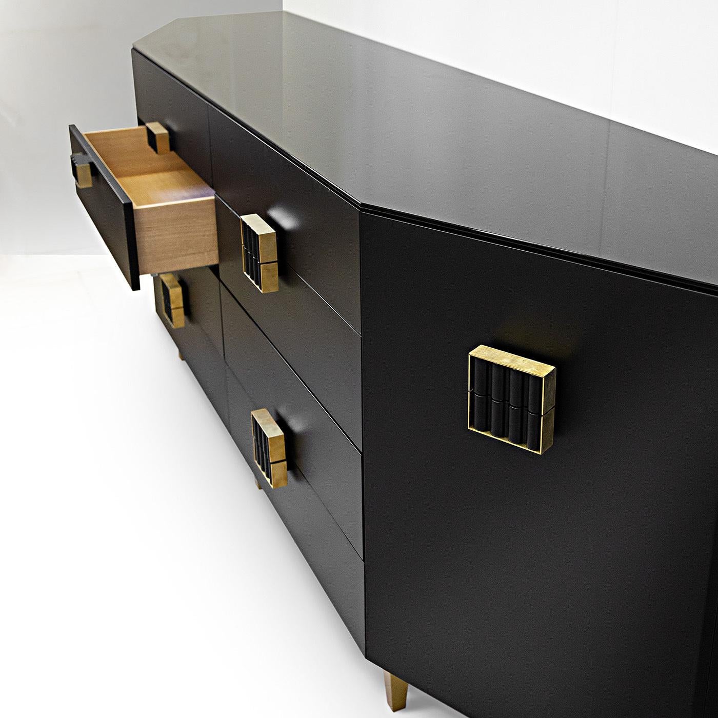 This elegant sideboard combines contemporary design with stunning Art Nouveau flair. Completely handcrafted of block-board wood with a matte black finish, this piece features eight front drawers and two side-flush drawers with a gorgeous black