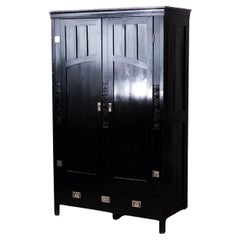 Black Art Nouveau Wardrobe with floral Carvings (Vienna, circa 1905)
