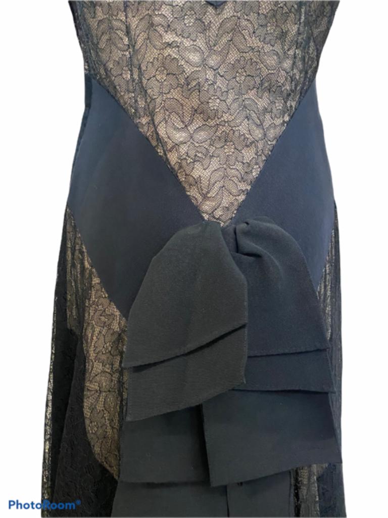 Traje de noche negro como la noche, de frac y encaje, años 40 Negro en venta