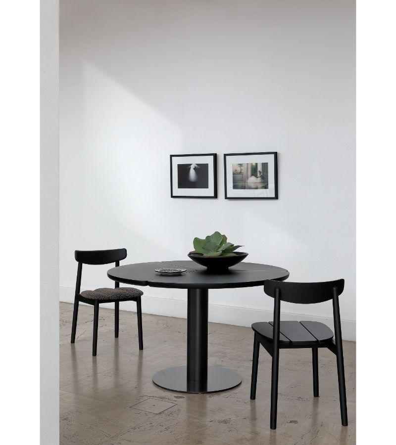 Black ash small klee table by Sebastian Herkner
Materials: Natural ash. Base in bronze metal. 
Technique: Black stained, lacquered metal. 
Dimensions: Diameter 120 x height 74 cm 
Available in natural oak and in size large. 


COEDITION is a