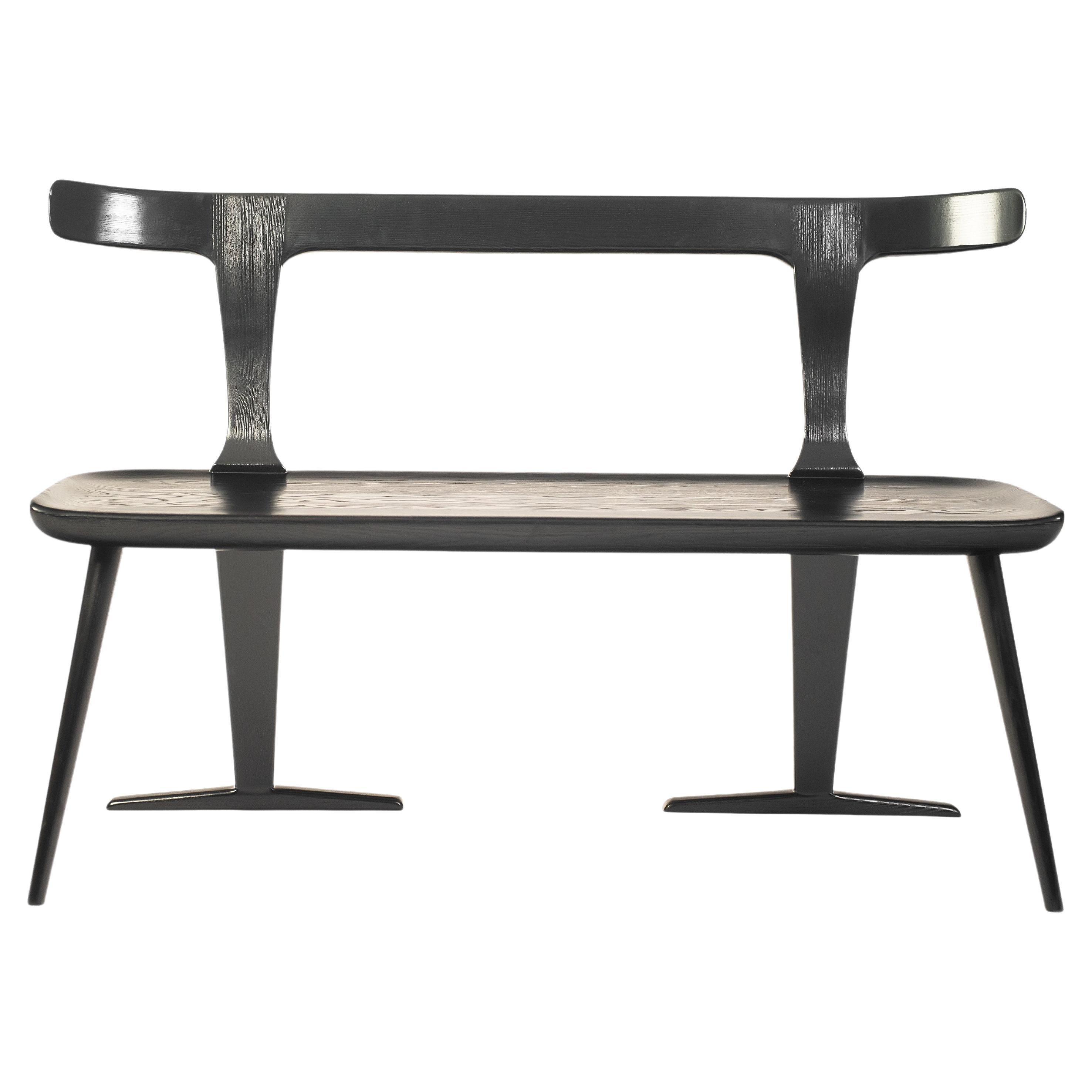 The eola bench provides a multi-use bench that can be easily placed in the kitchen, dining room, den, lounge or other space. With a double backing and forward angled legs, this Mid-Century Modern piece offers a uniqueness that otherwise cannot be