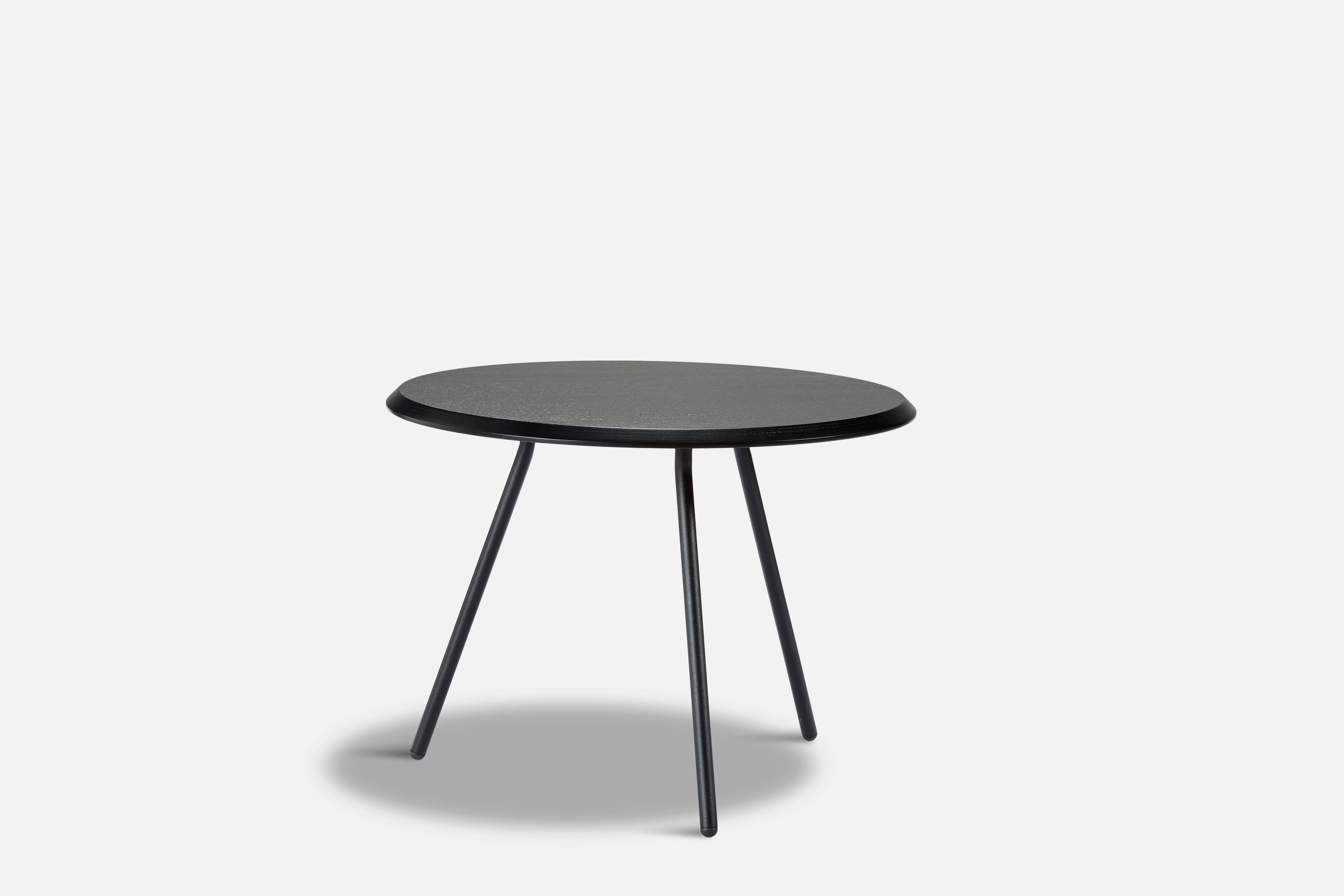 Black ash soround coffee table 60 by Nur Design
Materials: Metal, ash
Dimensions: D 60 x W 60 x H 49 cm
Also available in different sizes.

The founders, Mia and Torben Koed, decided to put their 30 years of experience into a new project. It