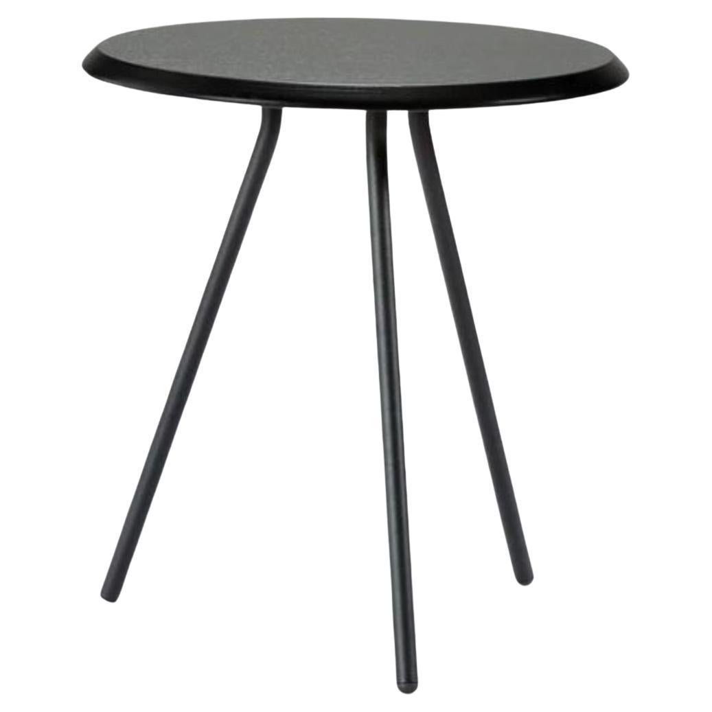 Black ash soround large side table by Nur Design
Materials: Metal, Ash.
Dimensions: D 45 x W 45 x H 49 cm

The founders, Mia and Torben Koed, decided to put their 30 years of experience into a new project. It was time for a change and a new