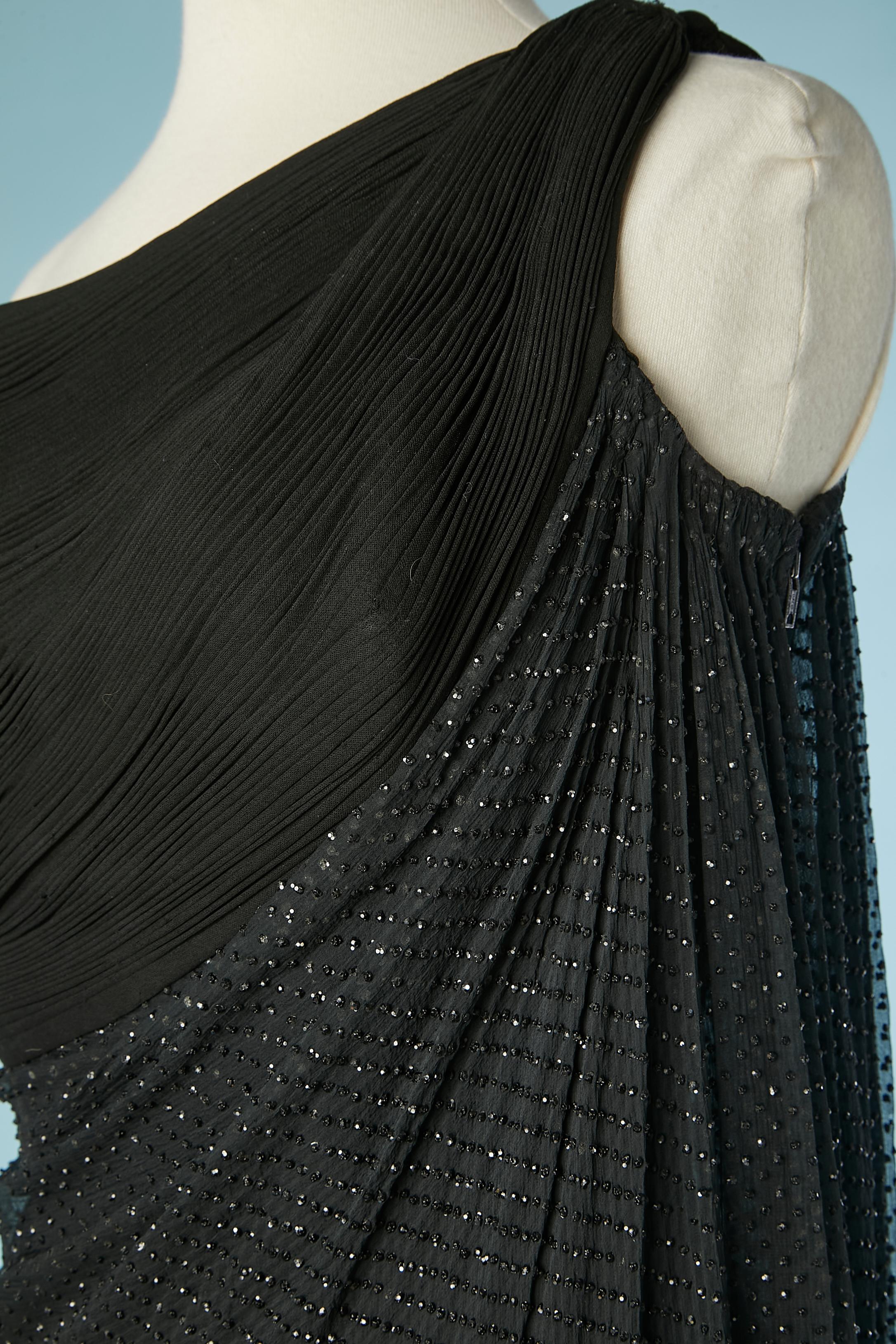Women's Black asymmetrical cocktail dress pleated and draped Grès 1962