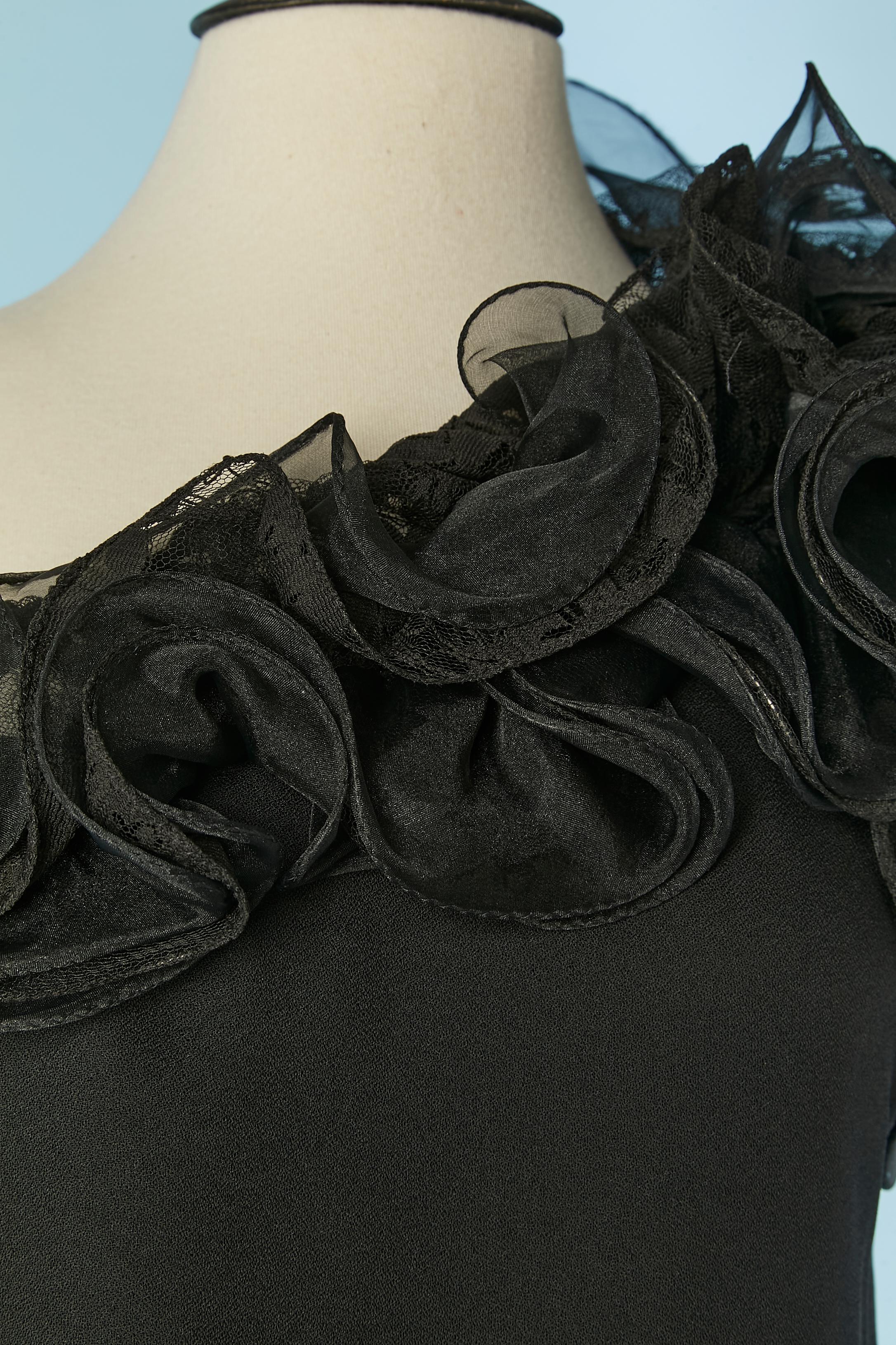 Black asymmetrical polyester cocktail dress with ruffles ( mix black polyester and black lace) on the neckline. Zip on the left side + hook&eye. 
SIZE L 