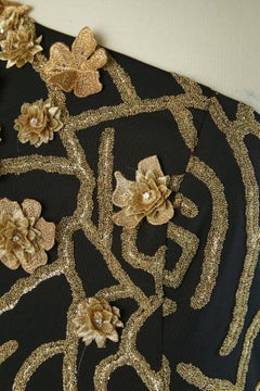 Black asymmetrical evening dress with gold flower  Gai Mattiolo The Red Carpet