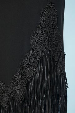 Abito da sera asimmetrico in jersey nero con frange  JIKI Monté-Carlo