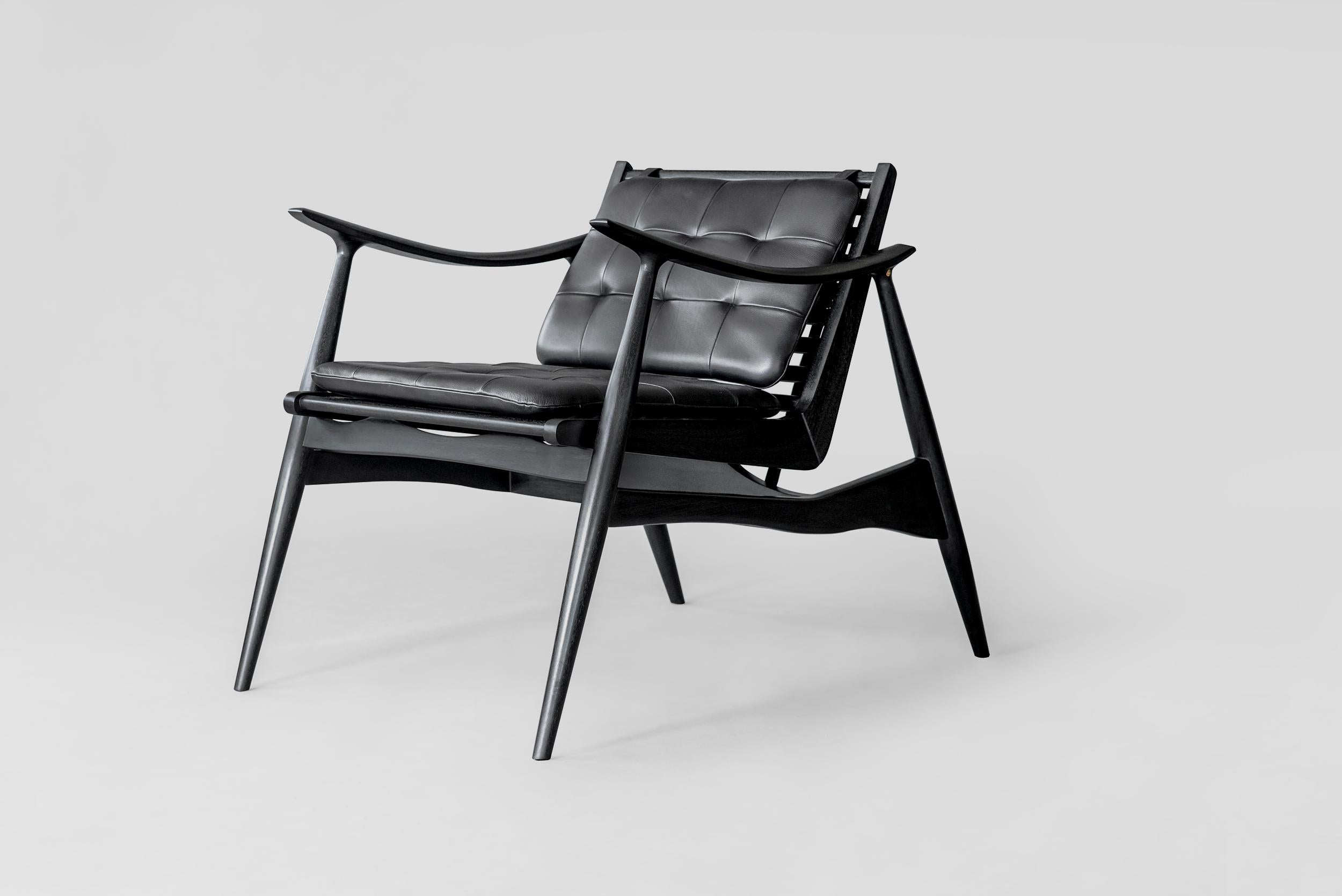 Black Atra lounge chair by Atra Design.
Dimensions: D 92 x W 66 x H 73 cm.
Materials: leather, mahogany, walnut.
Available in other colors.

Atra Design
We are Atra, a furniture brand produced by Atra form a mexico city–based high end