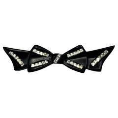 Black Bakelite bow brooch with  many rhinestones, 1950s USA