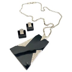 Black Bakelite, clear paste Art Deco style pendant and earrings, Trifari, 1960s