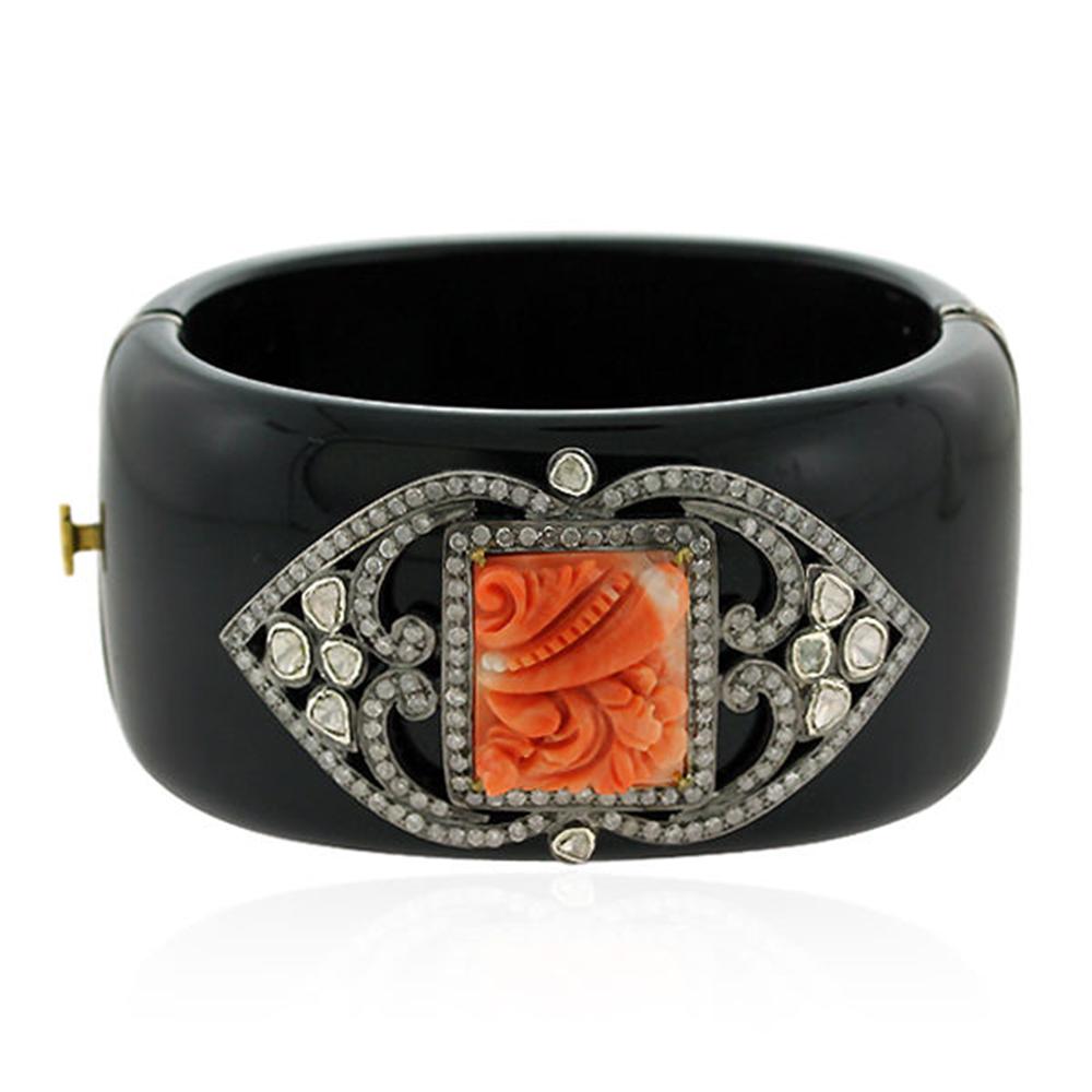 Artisan Black Bakelite Cuff with Carved Coral Motif and Diamonds