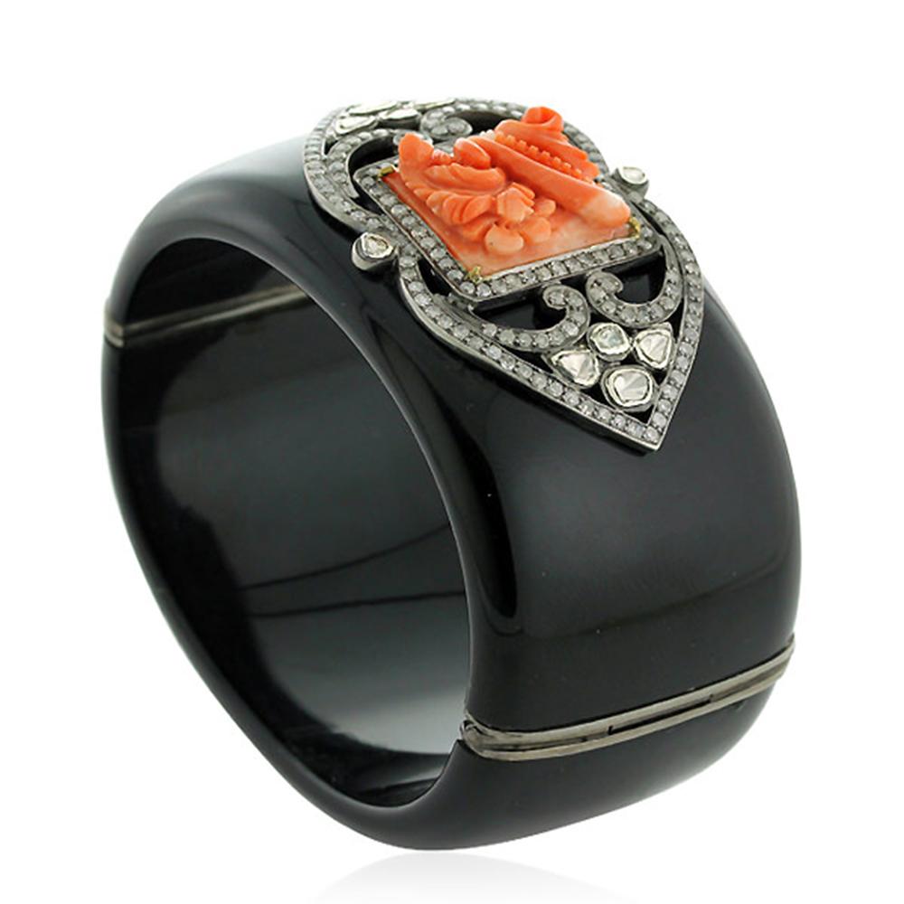 Black Bakelite Cuff with Carved Coral Motif and Diamonds