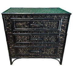 Commode en bambou noir et rotin, style British Colonial