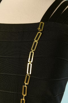 Black bandage cocktail dress with gold metal chain HERVE LEGER