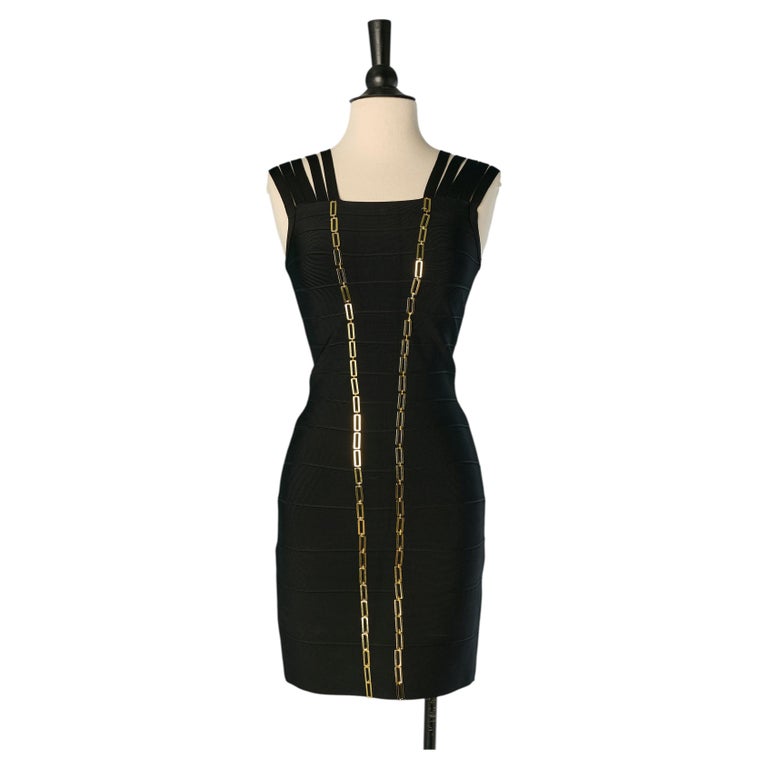 Black bandage cocktail dress with gold metal chain HERVE LEGER For Sale at 1stDibs