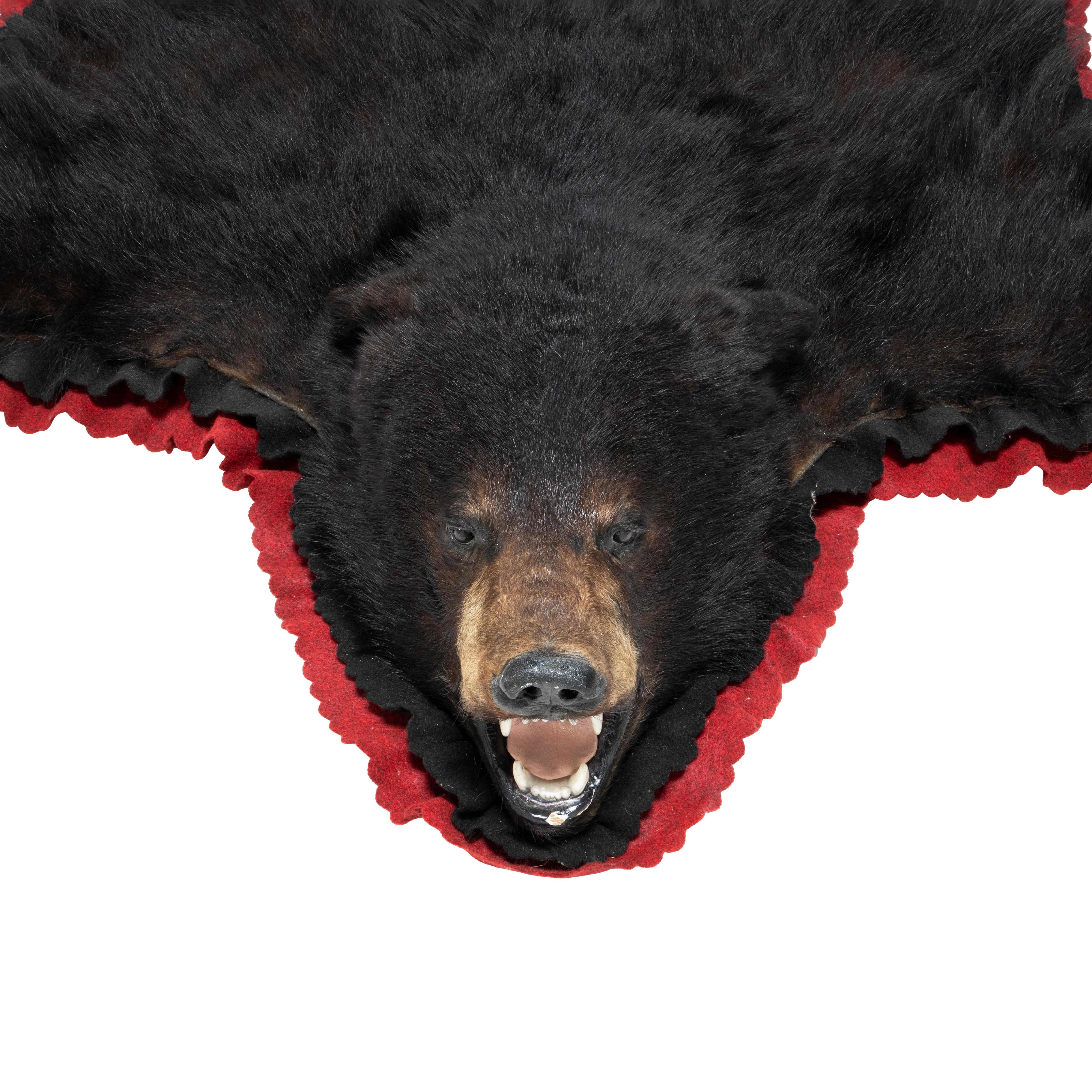 Black bear rug. Double felt black and barn red. 75