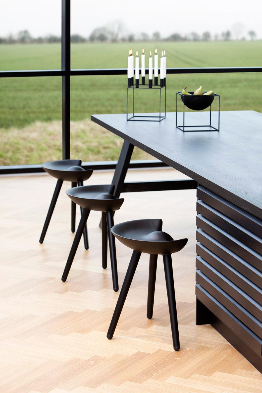 Black Beech Stool by Lassen
Dimensions: H 48 x W 36 x L 55.5 cm
Materials: Beech

In 1942 Mogens Lassen designed the Stool ML42 as a piece for a furniture exhibition held at the Danish Museum of Decorative Art. He took inspiration from the
