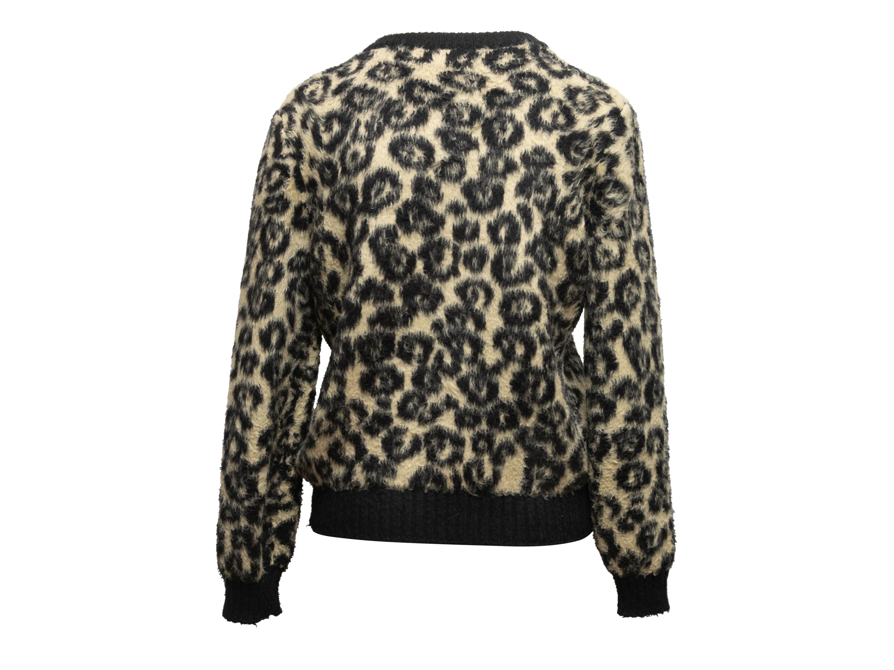 Schwarz-beiger Pullover mit Leopardenmuster von Celine. Rundhalsausschnitt. 40