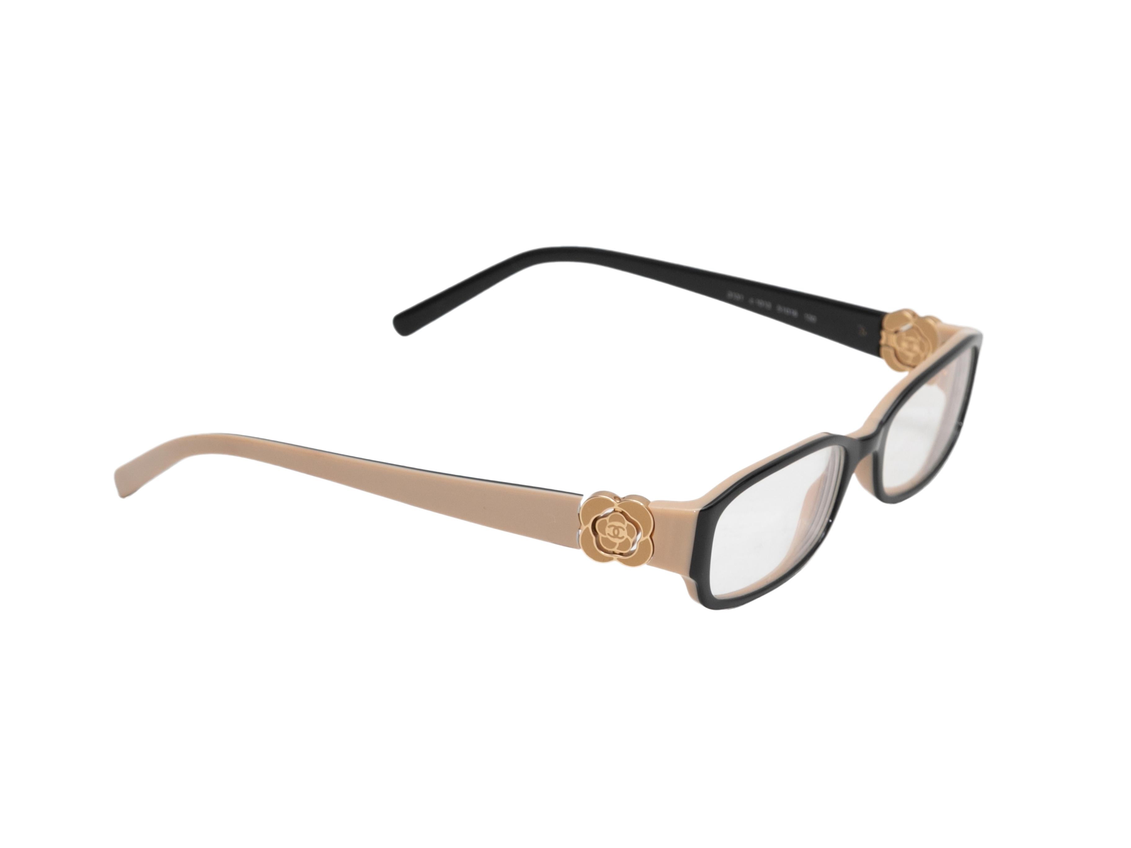 Black and beige acetate small camellia eyeglasses by Chanel. Prescription lenses. 1.25
