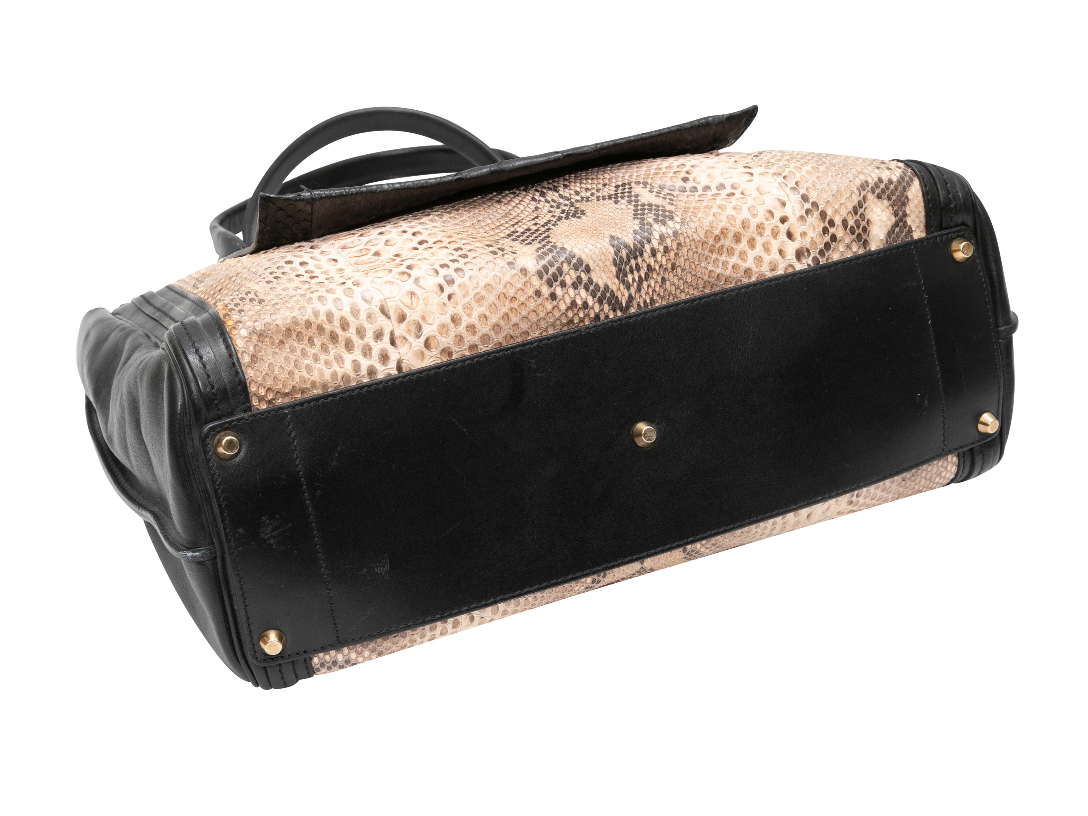 Black & Beige Chloe Leather & Python Tote Bag. This tote bag features a leather and python skin body, gold-tone hardware, dual rolled top handles, an exterior front pocket, and an optional single flat shoulder strap. 17