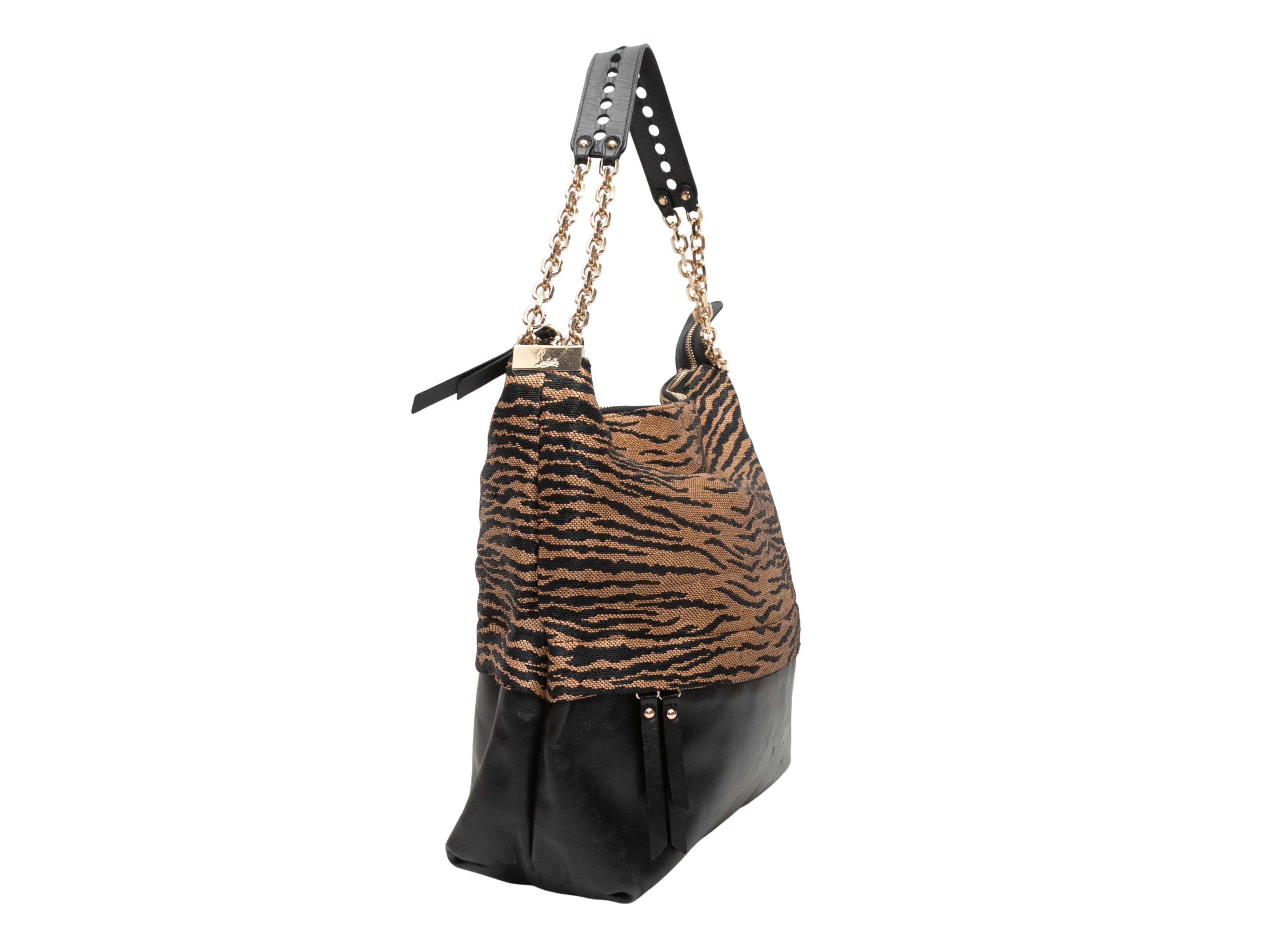  Black & Beige Christian Louboutin Leather & Raffia Hobo Bag. This hobo bag features a tiger patterned raffia and leather body, gold-tone hardware, a single flat leather and chain-link shoulder strap, and a top zip closure. 12.5